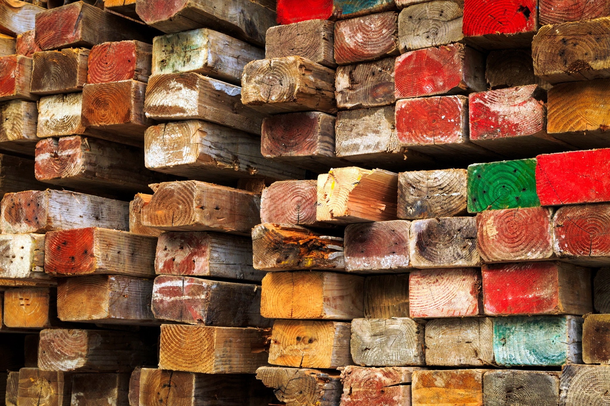Stack of colorful painted lumber and wood texture HD Wallpaper
