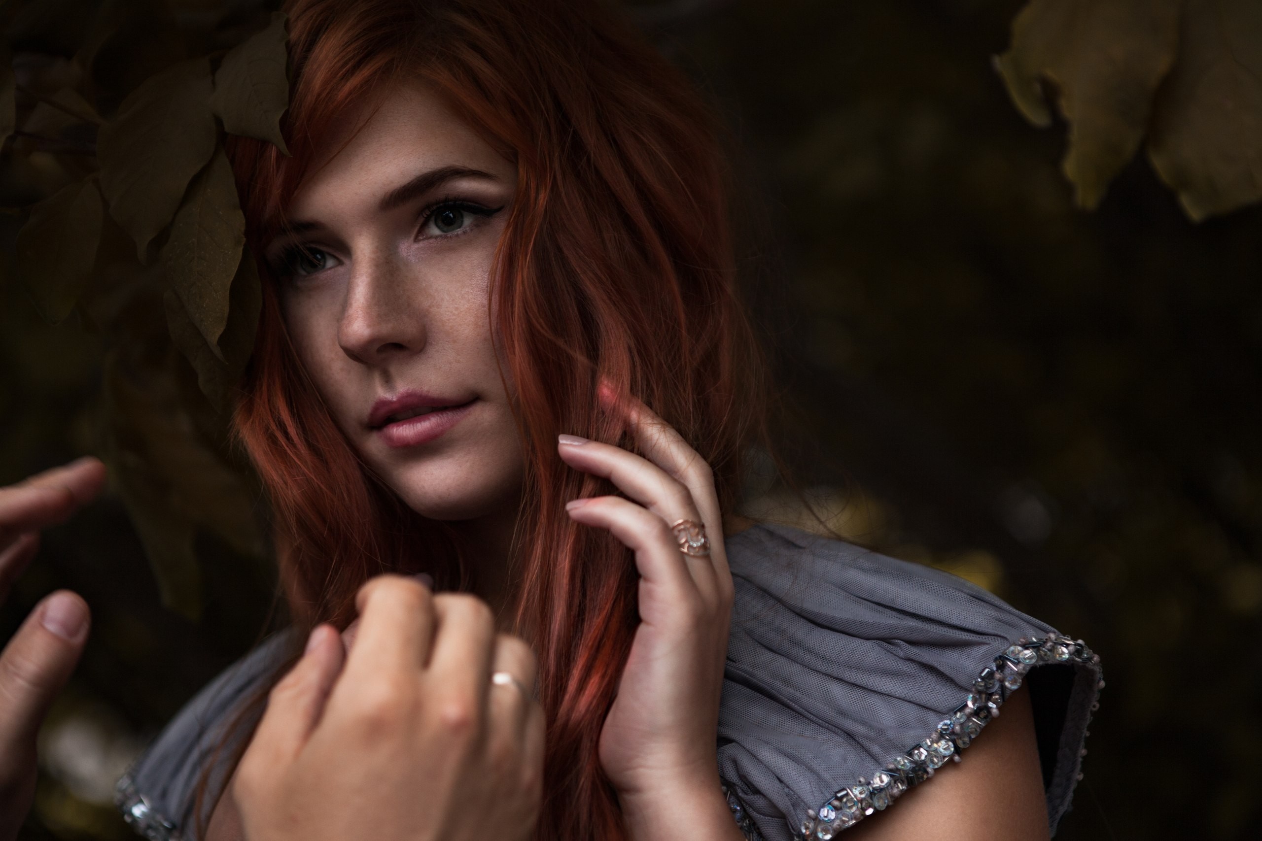 Redhead woman with rings and grey dress HD Wallpaper