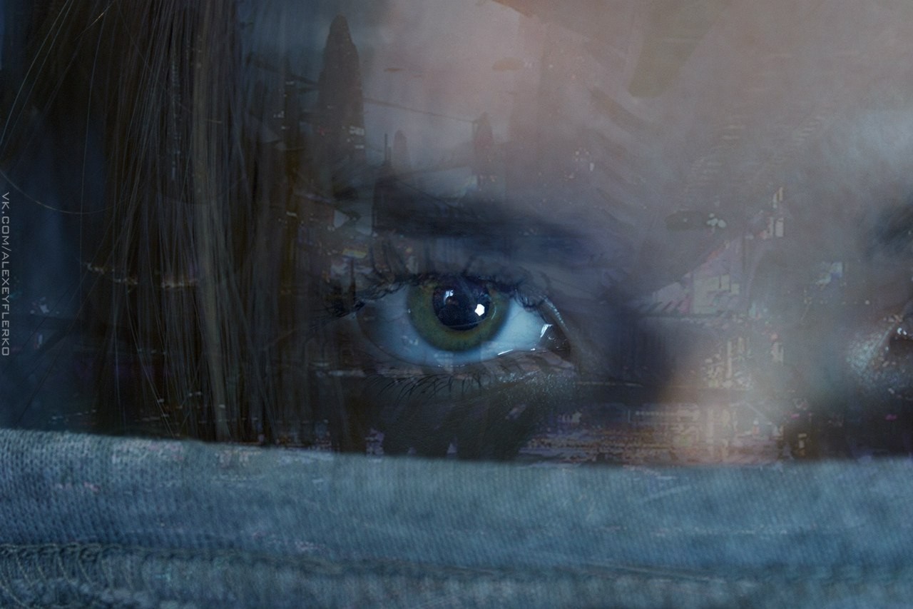 Close up of a woman's eye with city overlay HD Wallpaper