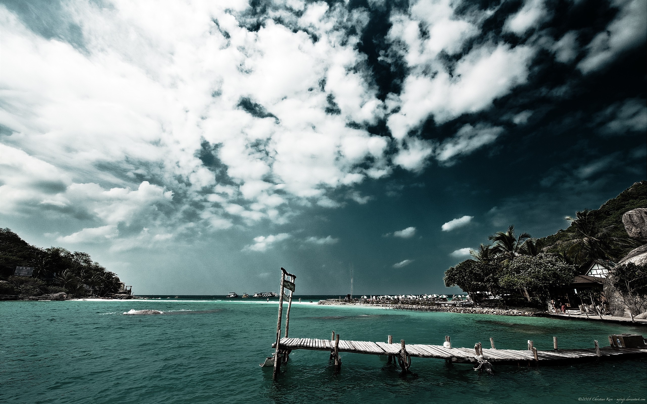 Wooden pier on a tropical bay with cloudy sky HD Wallpaper
