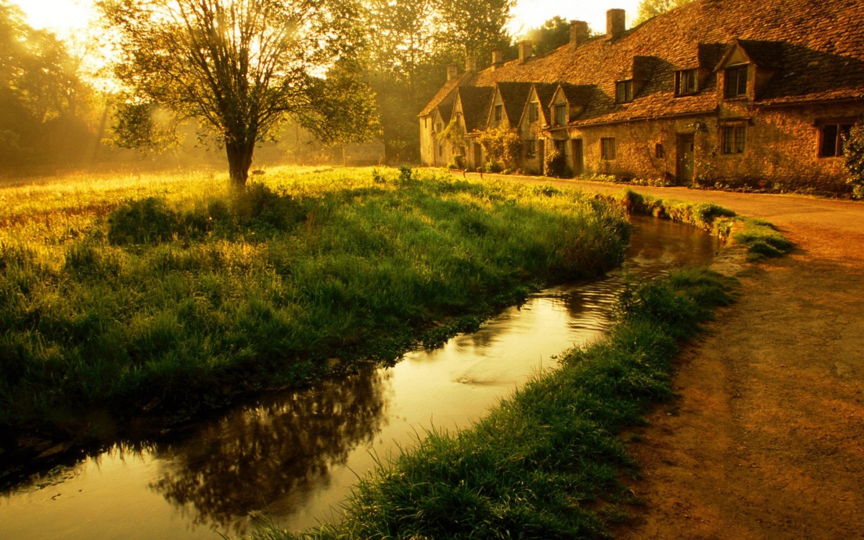 Cotswold village with stream at sunrise HD Wallpaper
