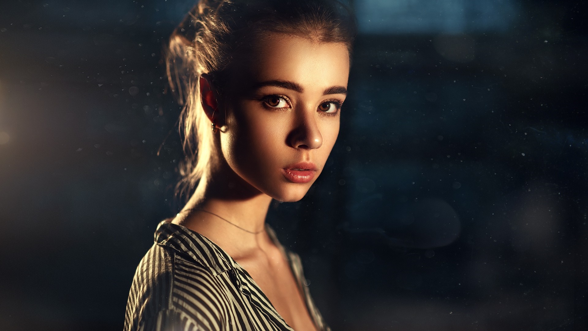 Woman with dark hair and striped shirt HD Wallpaper