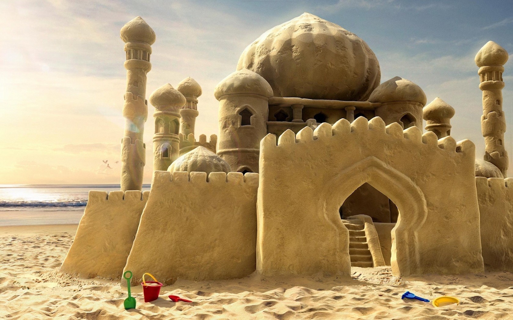 Sandcastle mosque on a beach HD Wallpaper