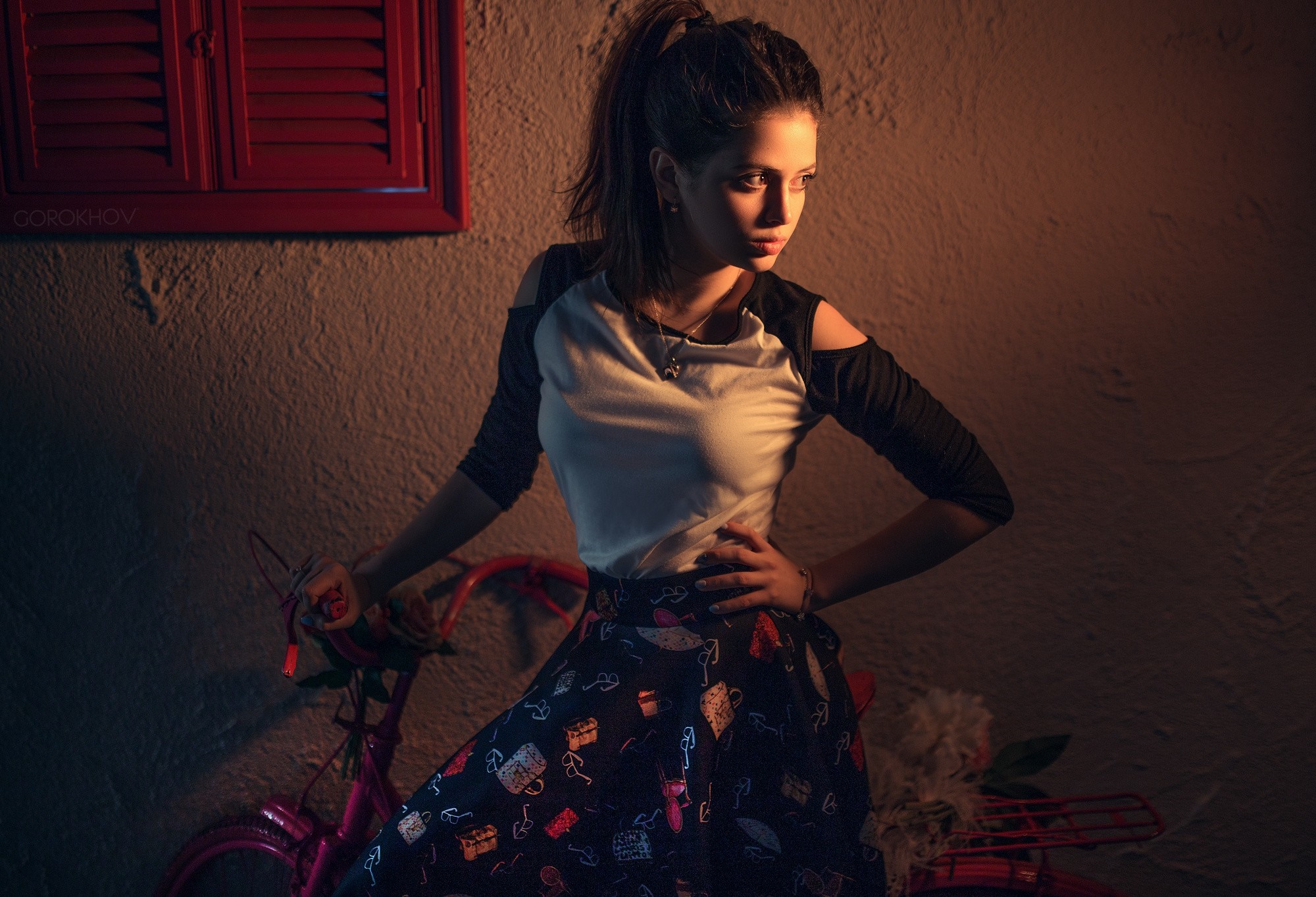 Woman in patterned skirt with bicycle HD Wallpaper