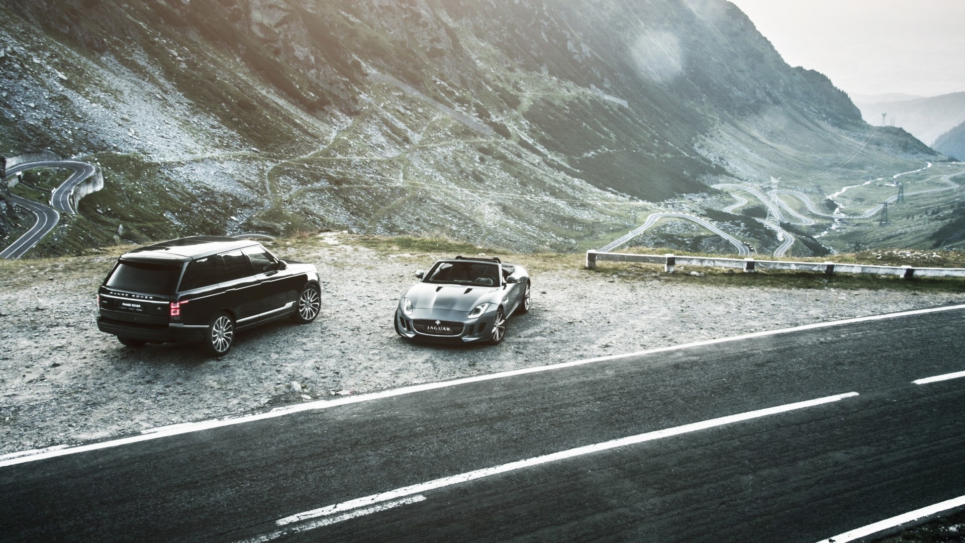 Range Rover and Jaguar convertible on Transfagarasan road HD Wallpaper