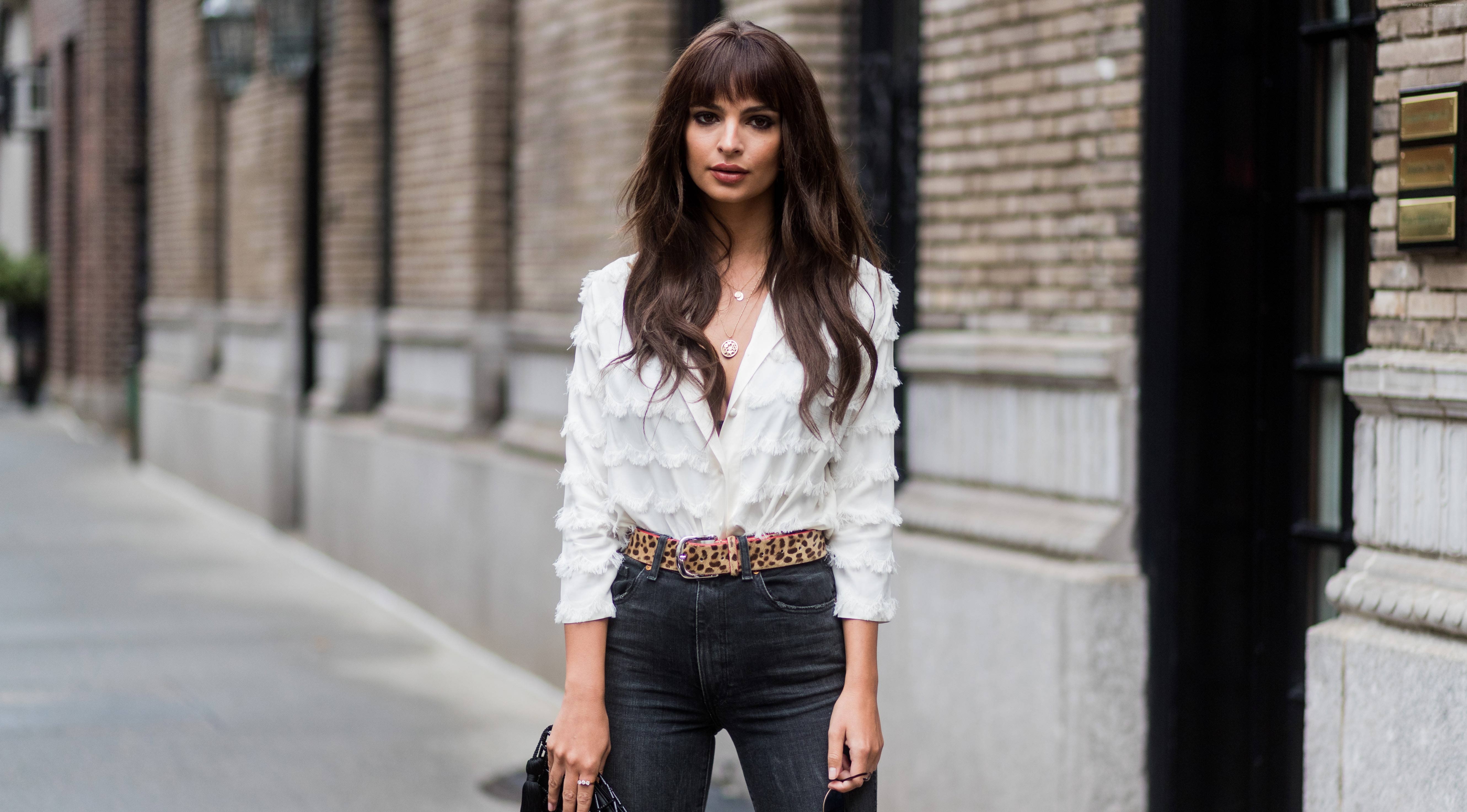 Emily Ratajkowski wearing a white top and jeans HD Wallpaper