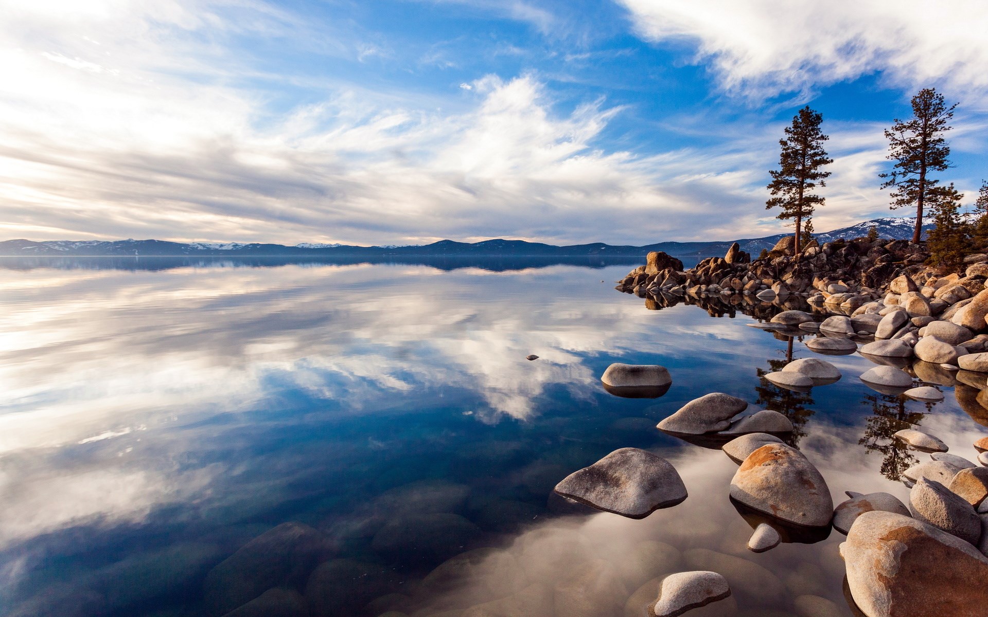 Lake Tahoe with Rocky Shoreline and Pine Trees HD Wallpaper