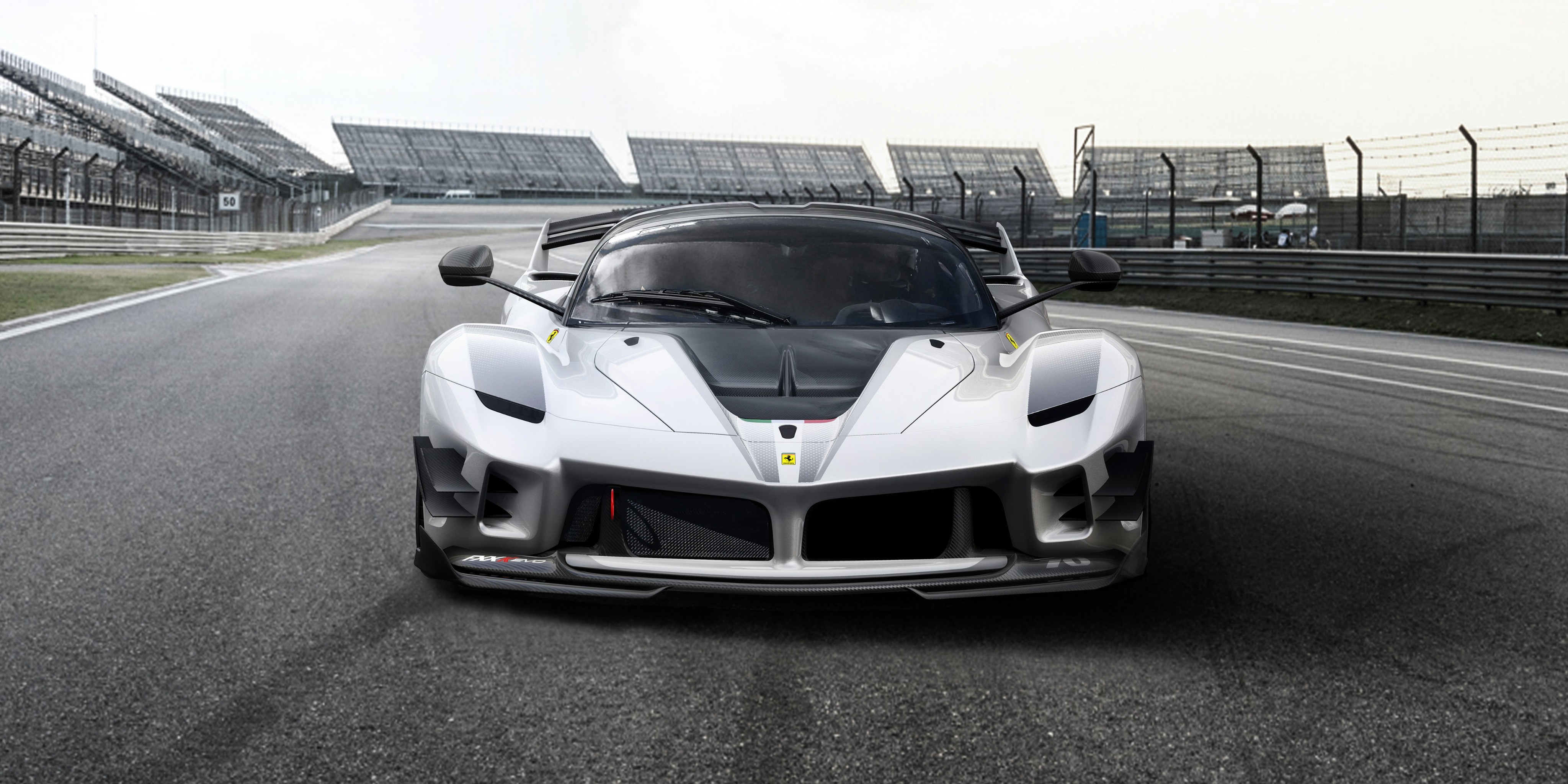 Ferrari FXX-K Evo on a race track HD Wallpaper