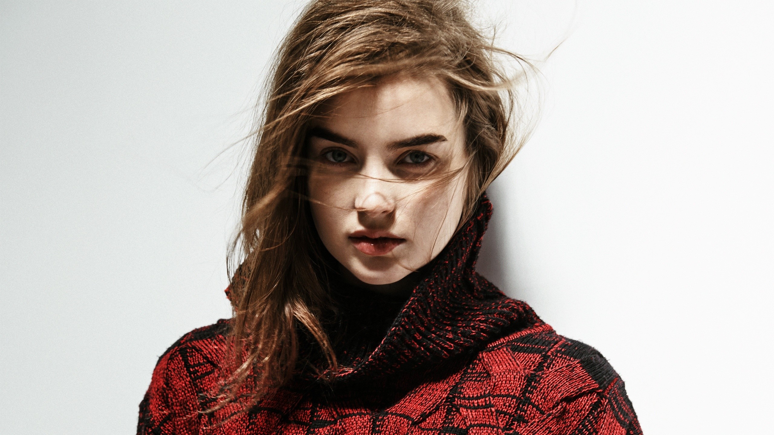 Woman with brown hair wearing a red sweater HD Wallpaper