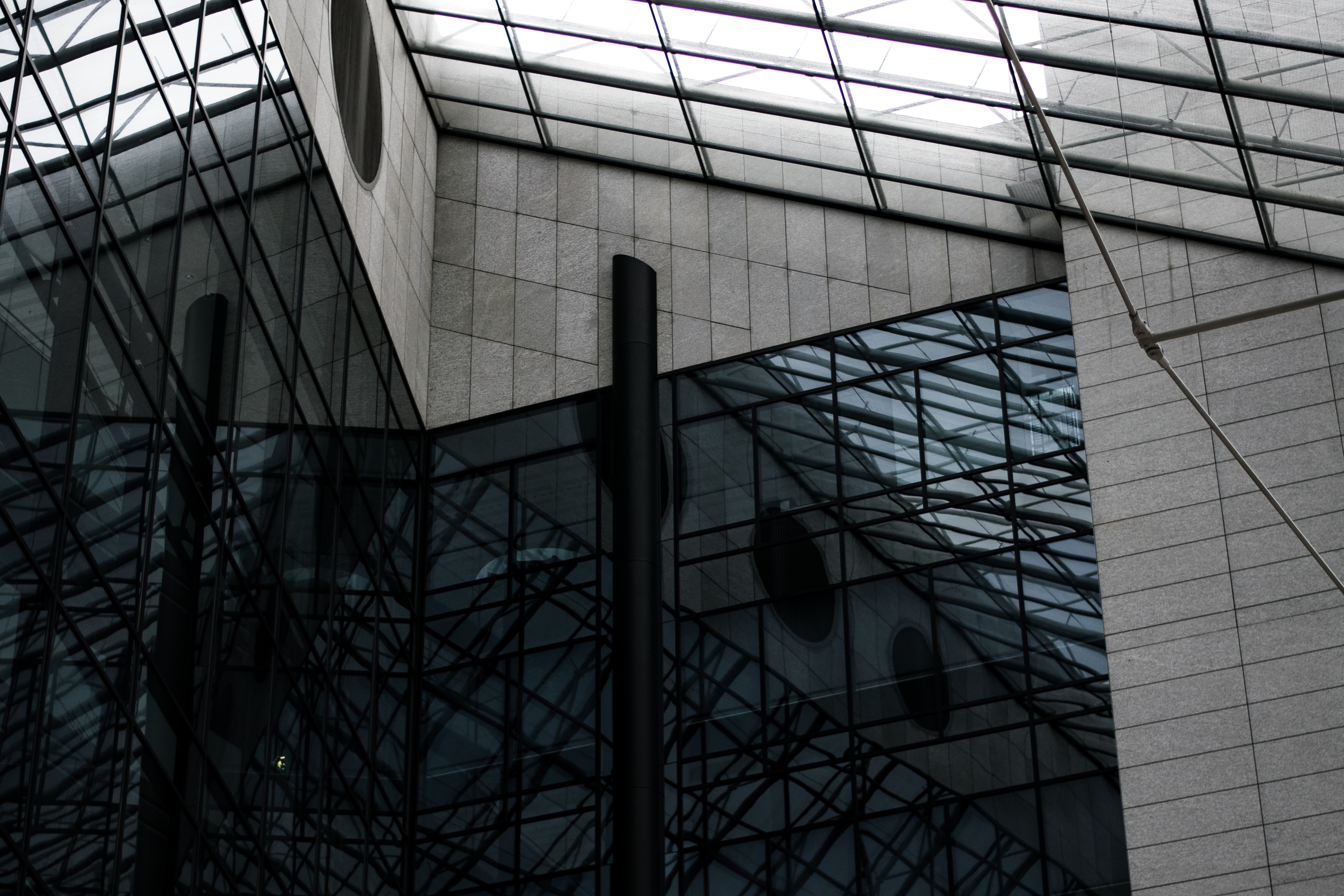 Modern architecture with glass facade and reflections HD Wallpaper