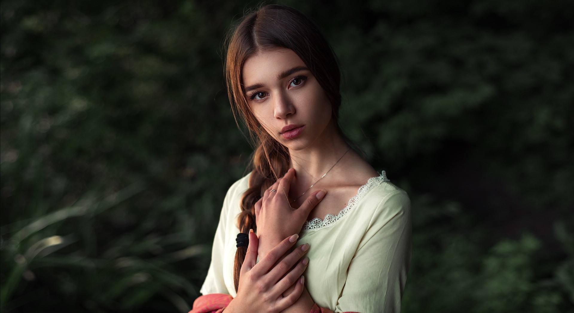 Woman with braid looking at viewer outdoors HD Wallpaper