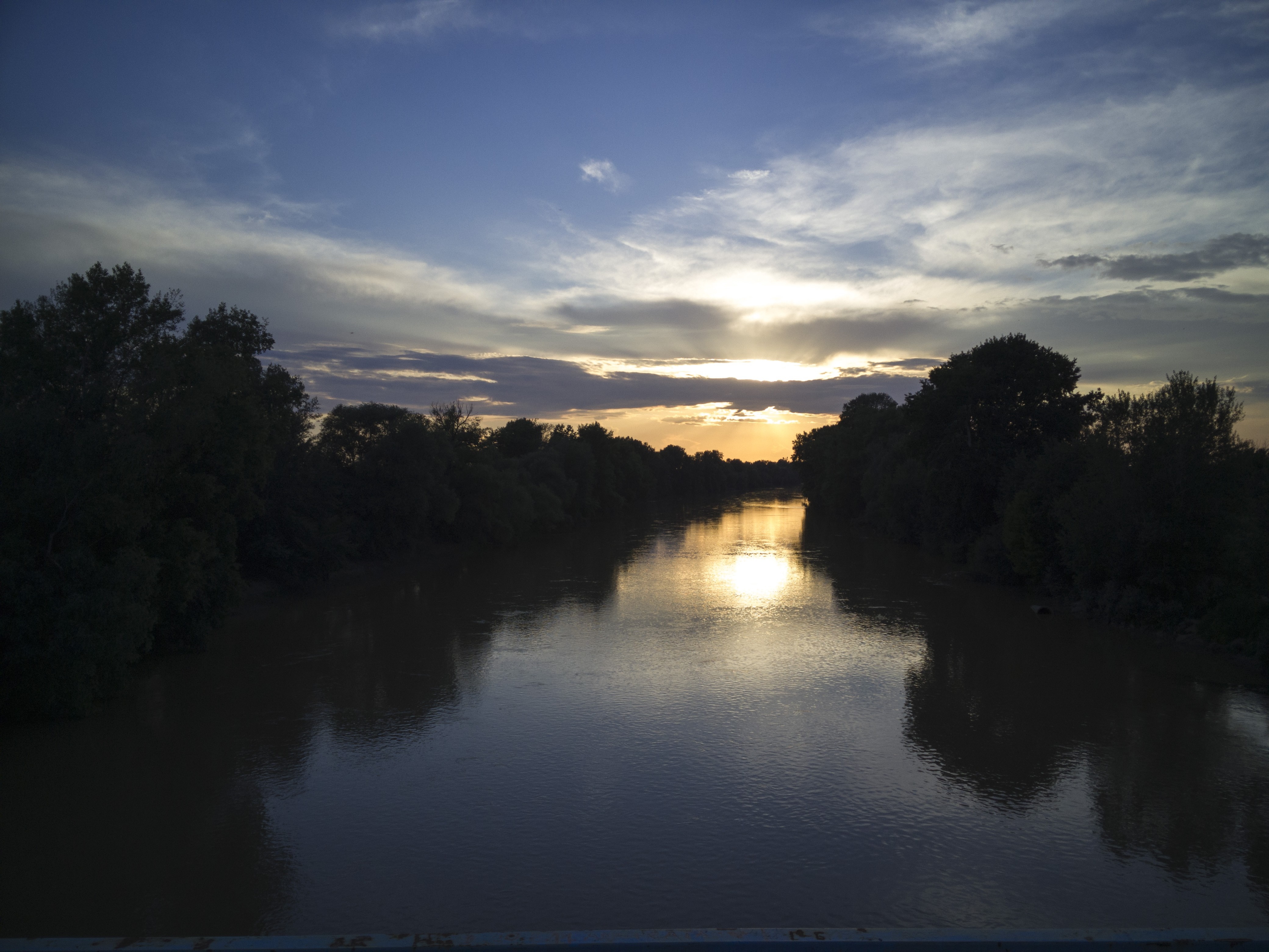 River at sunset with trees and clouds HD Wallpaper