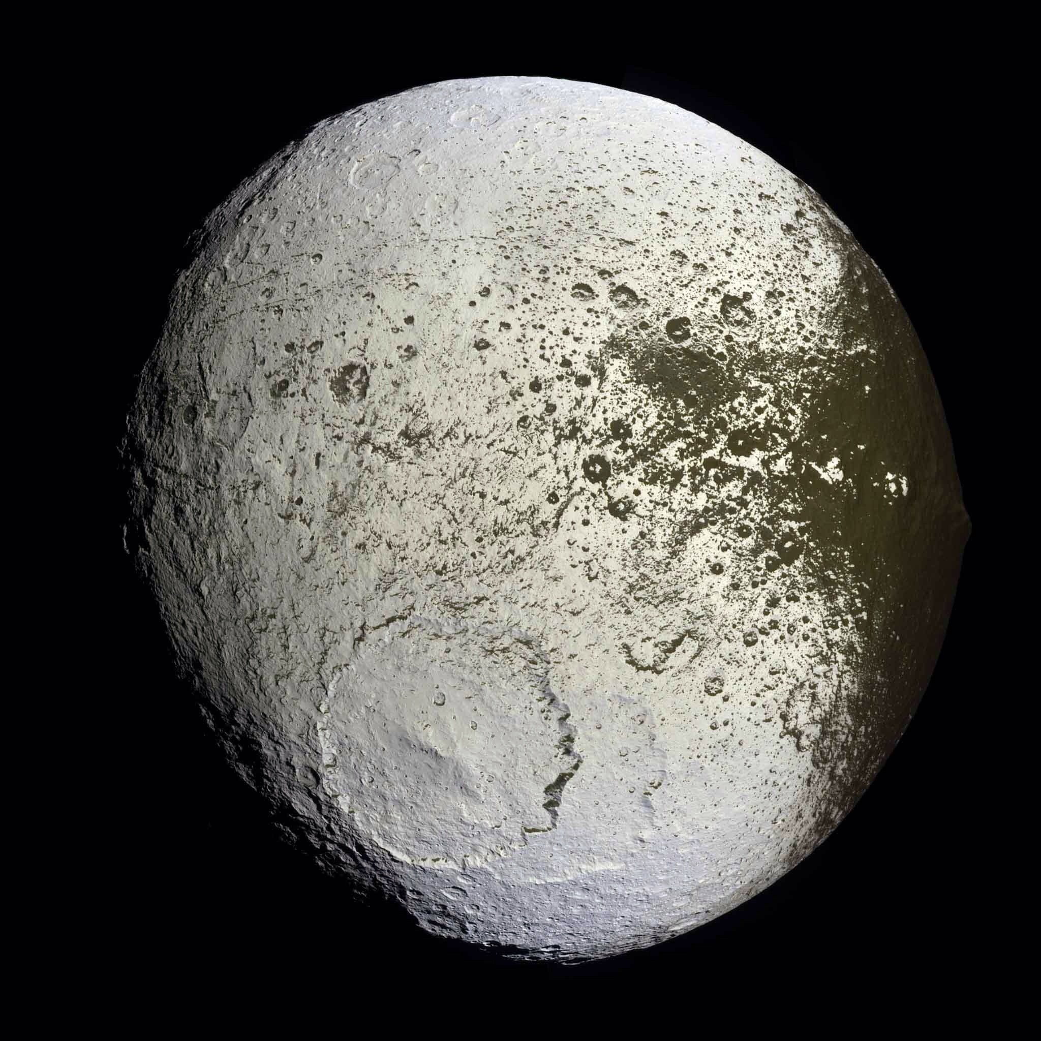 Iapetus moon of Saturn with dark and bright hemispheres HD Wallpaper