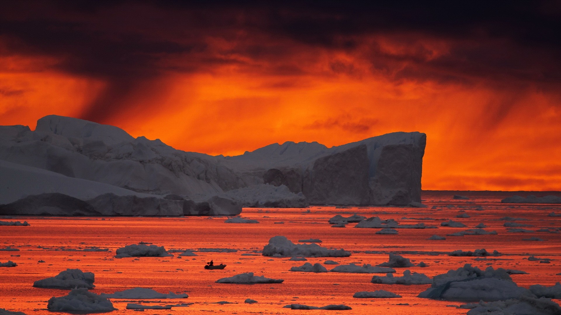 Icebergs and a small boat at sunset HD Wallpaper