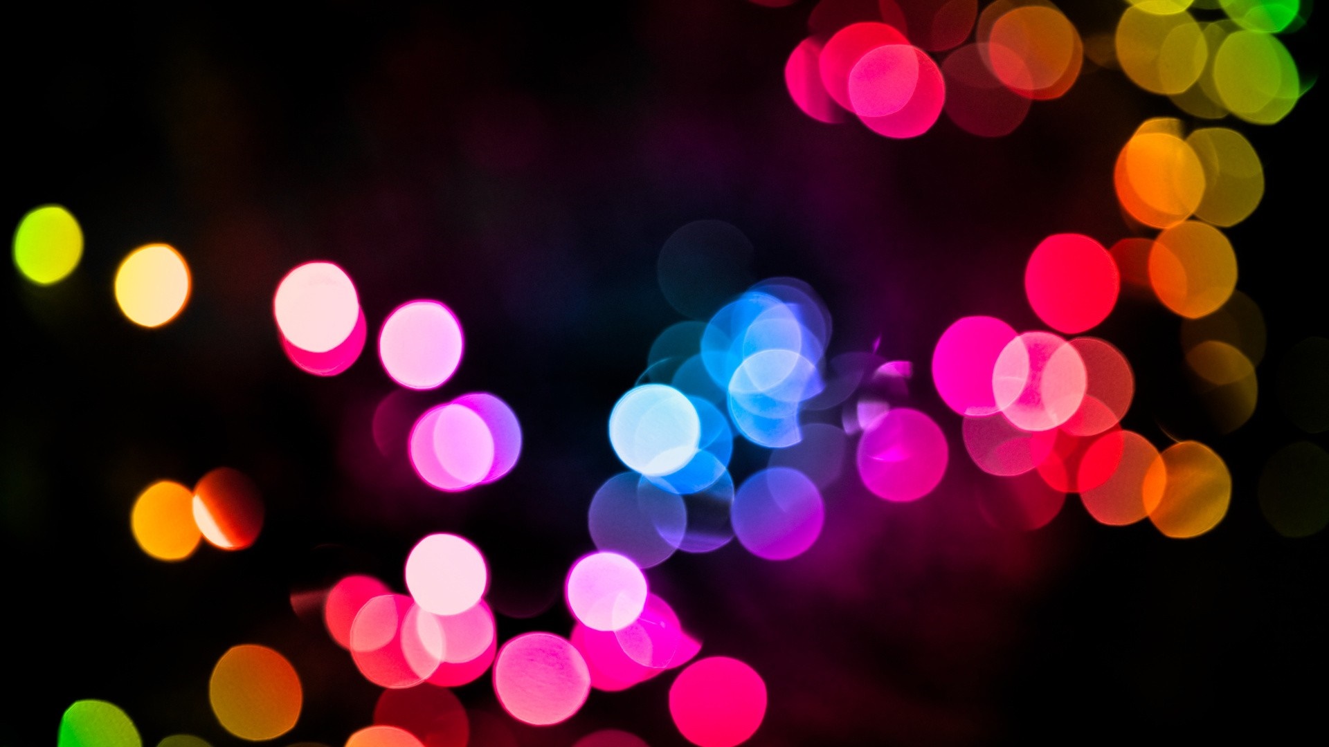 Colorful bokeh lights on a black background HD Wallpaper