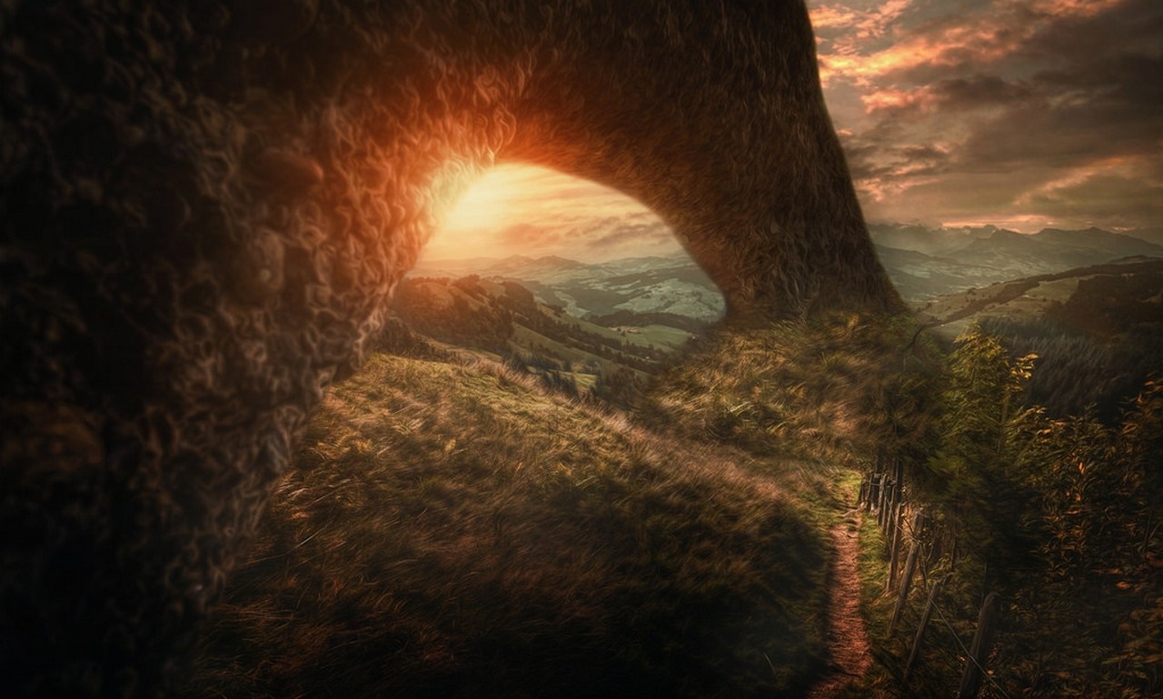 Archway overlooking a valley at sunset HD Wallpaper