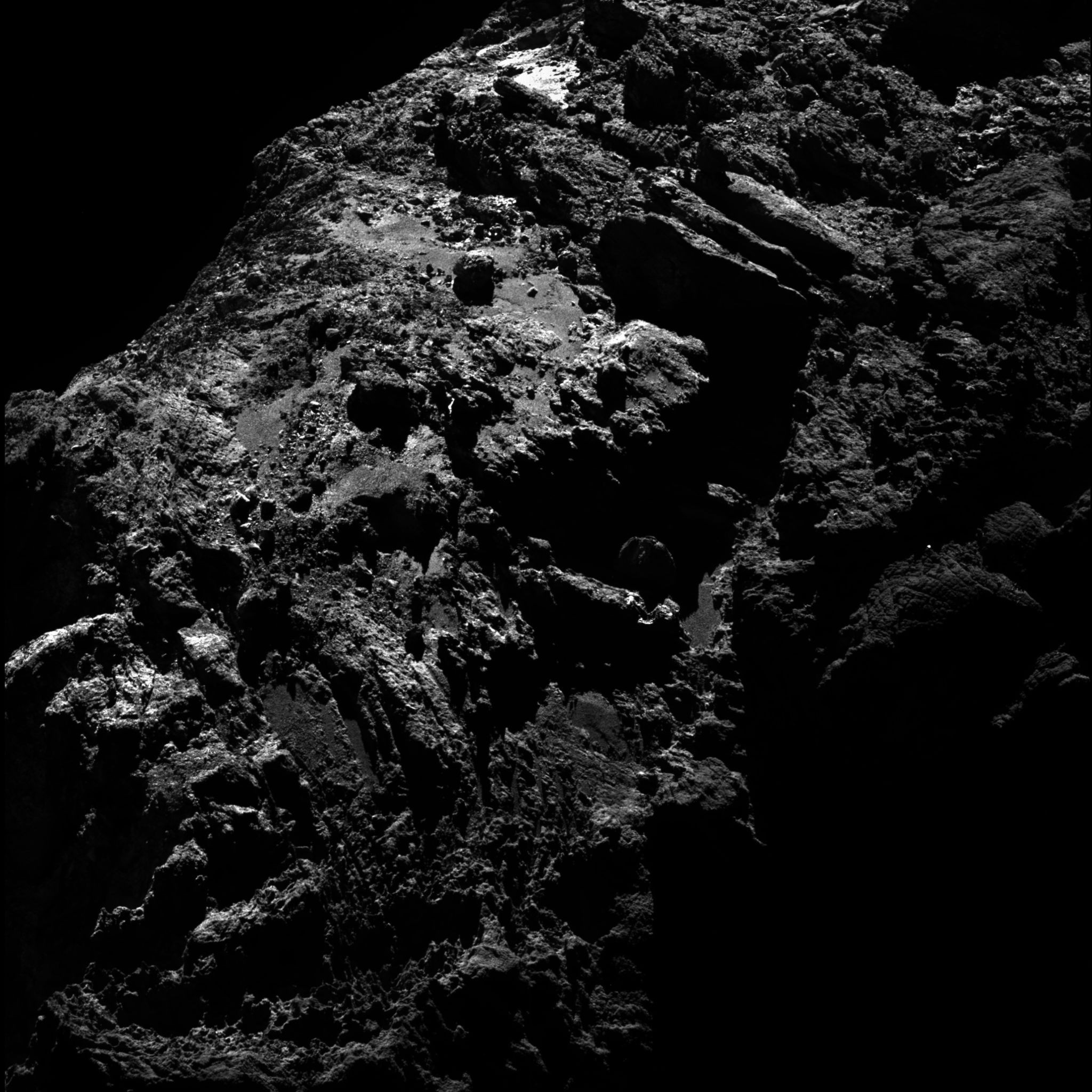 Close-up of a rocky comet surface HD Wallpaper