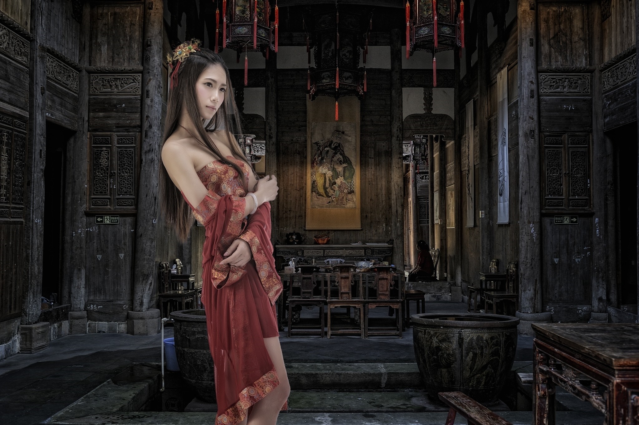 Asian woman in traditional red dress in ancient Chinese interior HD Wallpaper