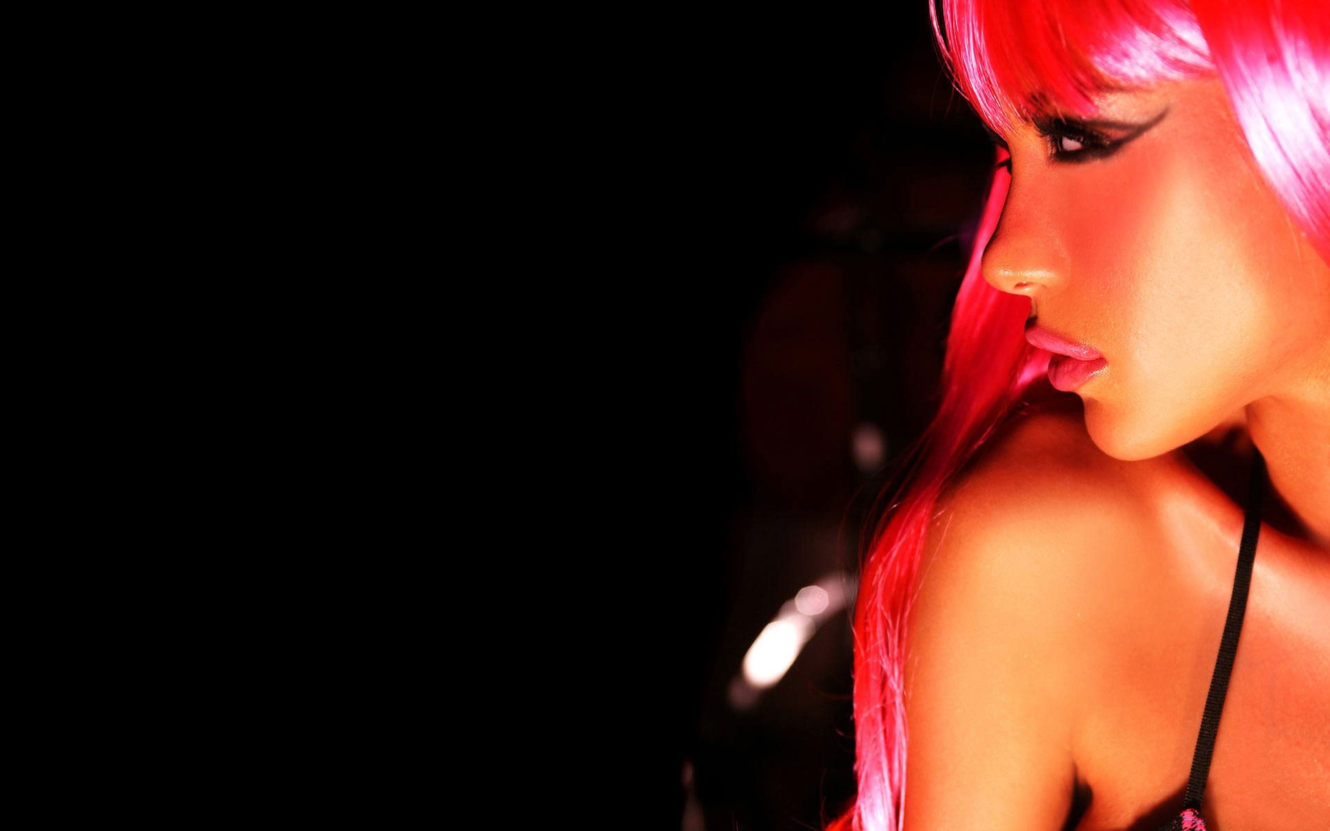 Woman with pink hair and makeup in profile HD Wallpaper