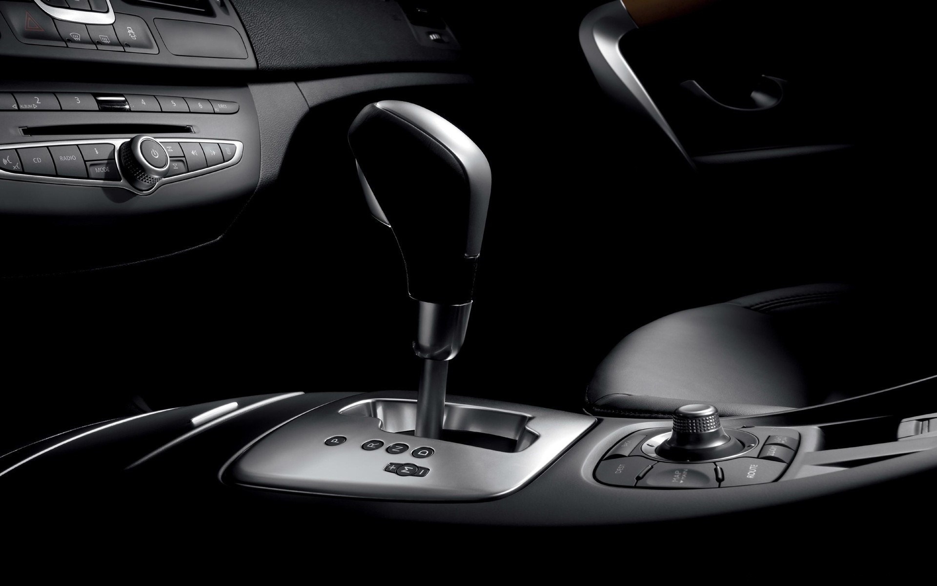 Car interior with automatic gear shifter and dashboard controls HD Wallpaper