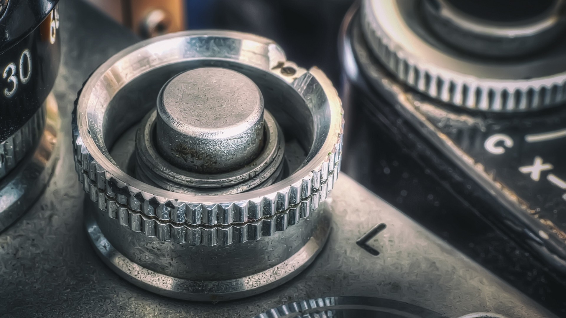 Close-up of vintage camera dials and buttons HD Wallpaper