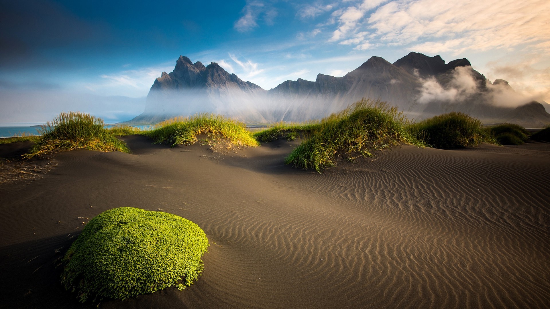 Black sand dunes and mountains at sunrise HD Wallpaper