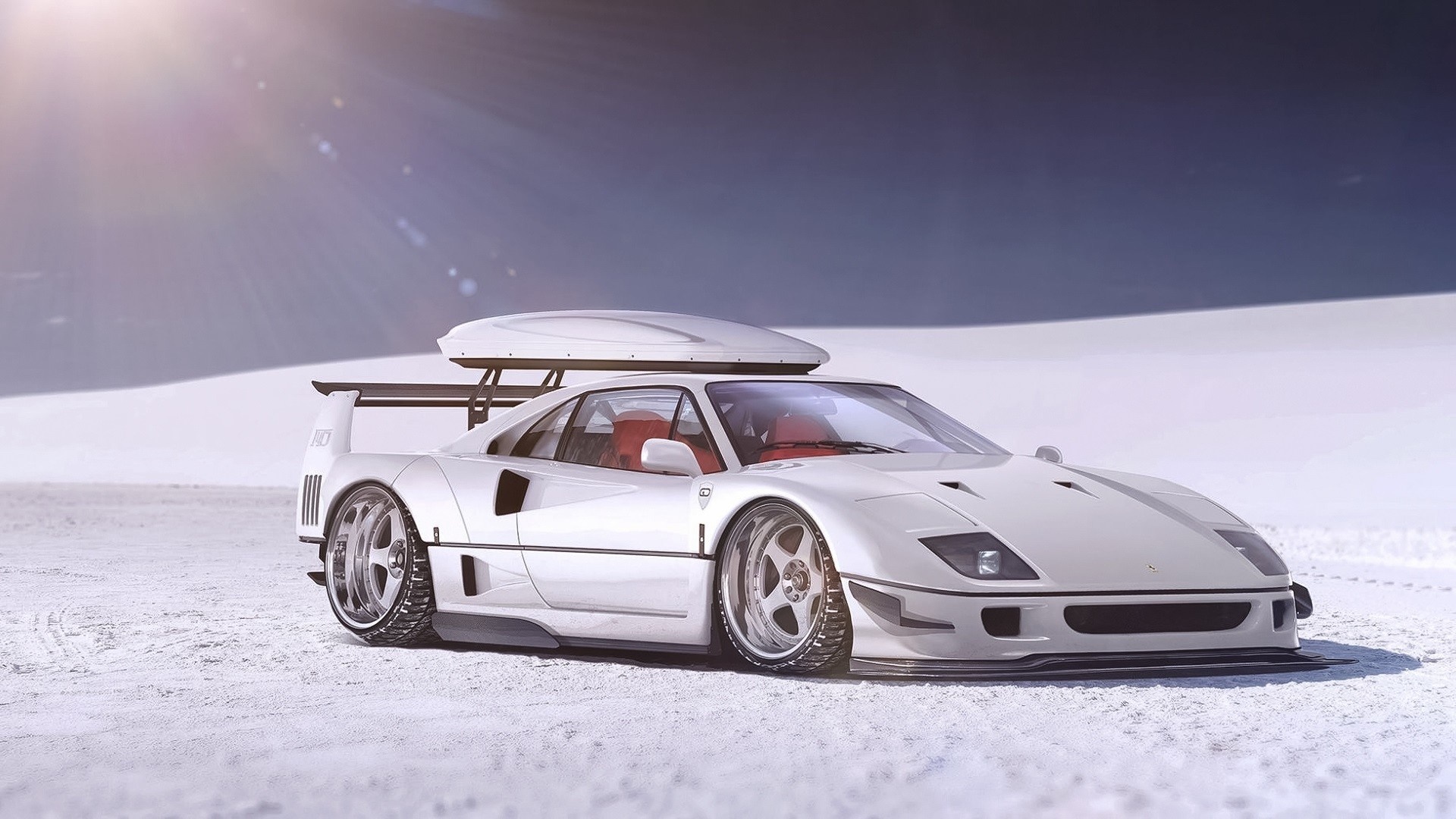 White Ferrari F40 with roof box in snow HD Wallpaper