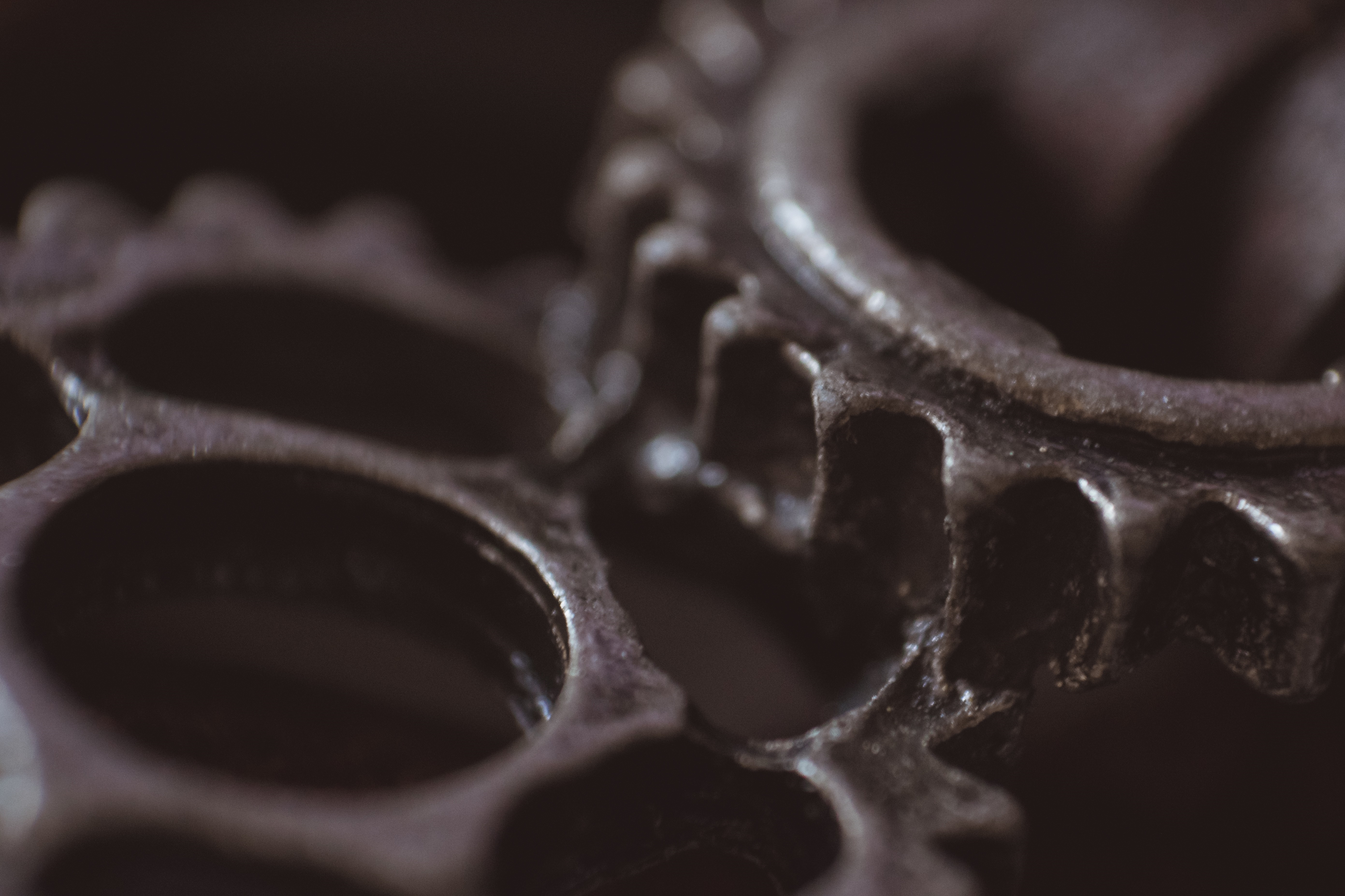 Close-up of interlocking metal gears HD Wallpaper