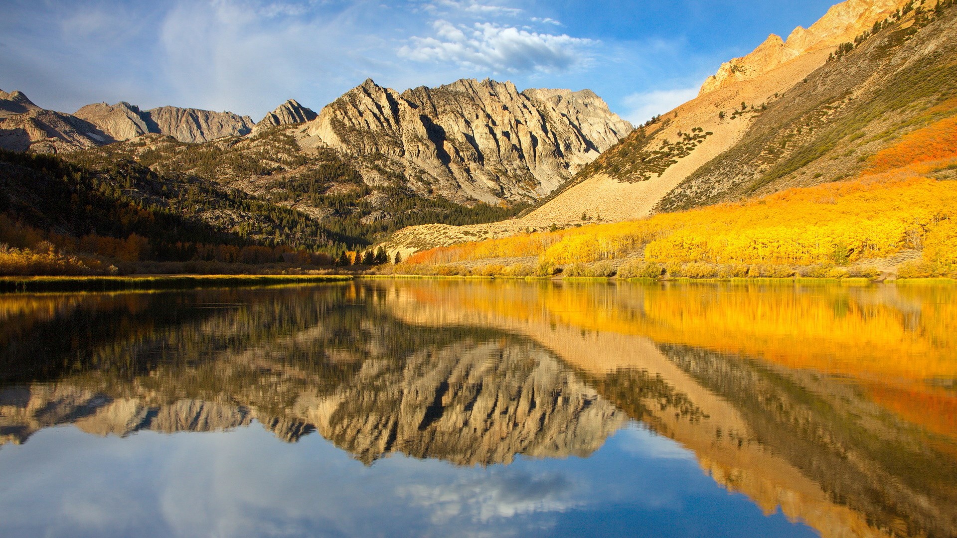 Mountain lake with autumn foliage reflection HD Wallpaper