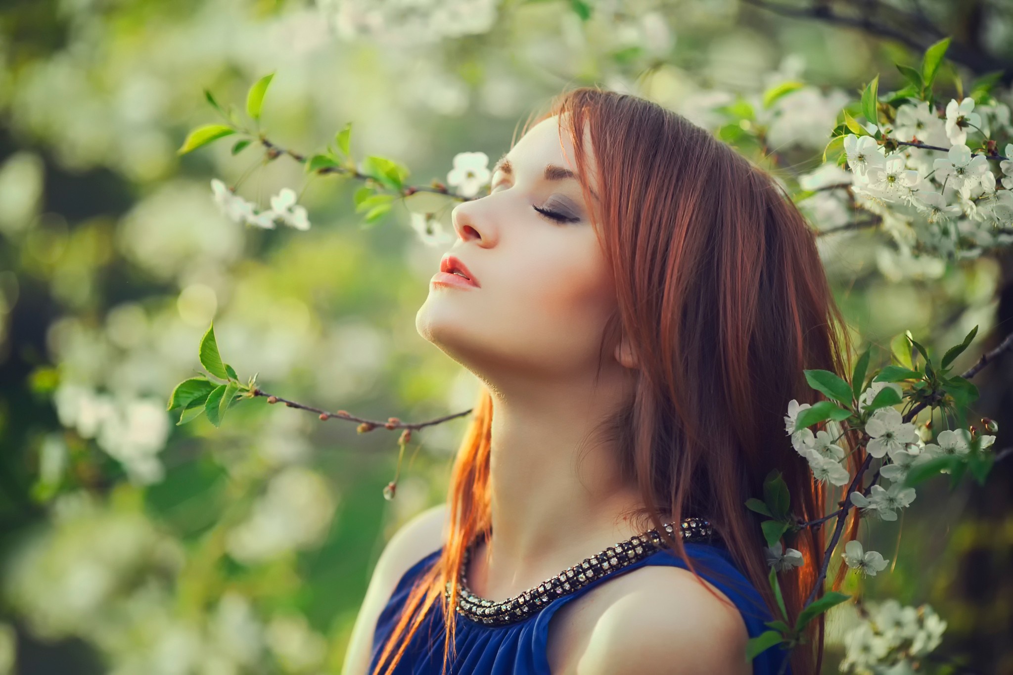 Woman with closed eyes in a blue dress among flowers HD Wallpaper