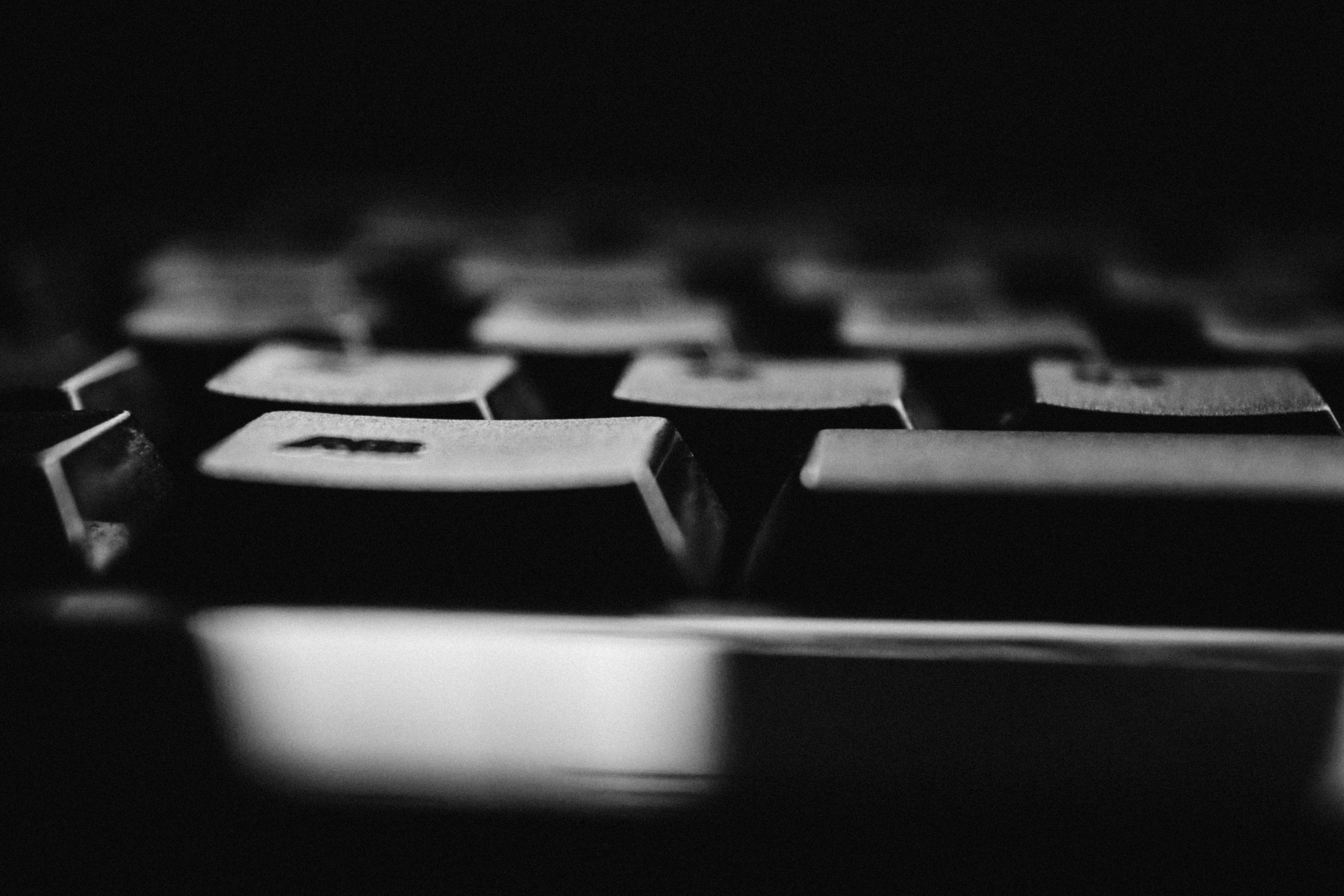 Monochrome close-up of a computer keyboard HD Wallpaper