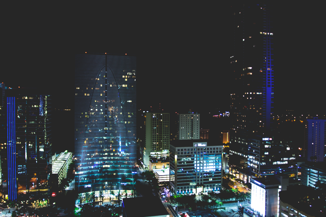 Night cityscape with illuminated skyscrapers in Miami HD Wallpaper
