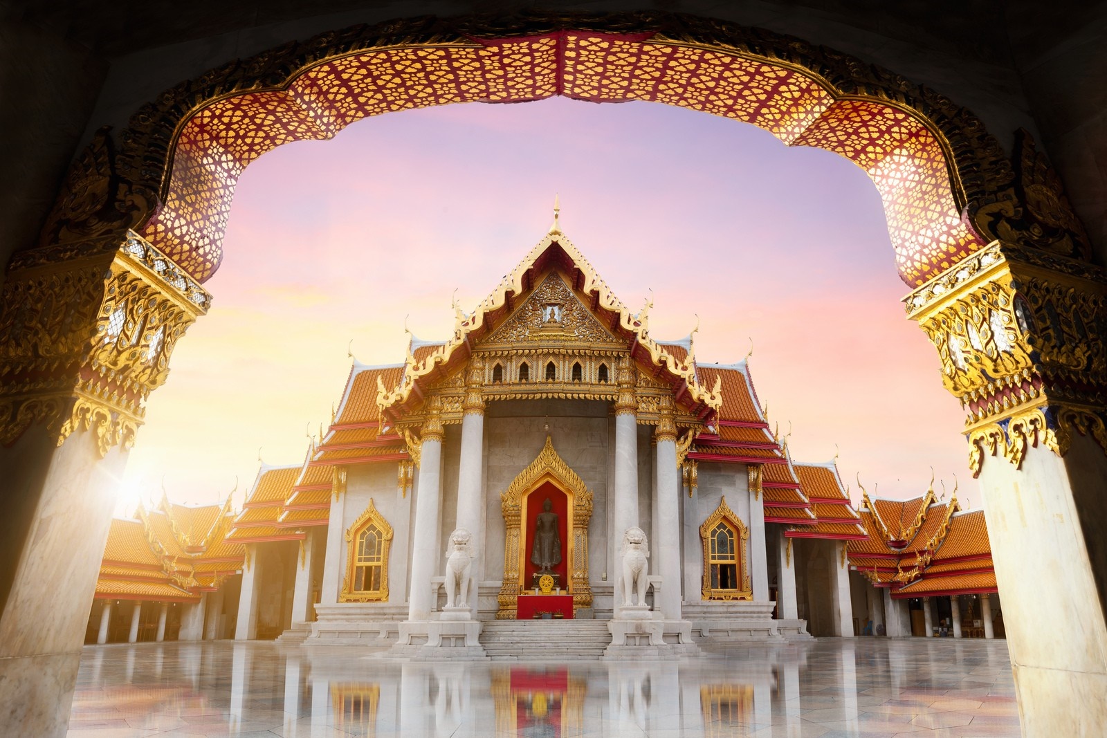 Thai Temple with Golden Ornate Archway at Sunset HD Wallpaper