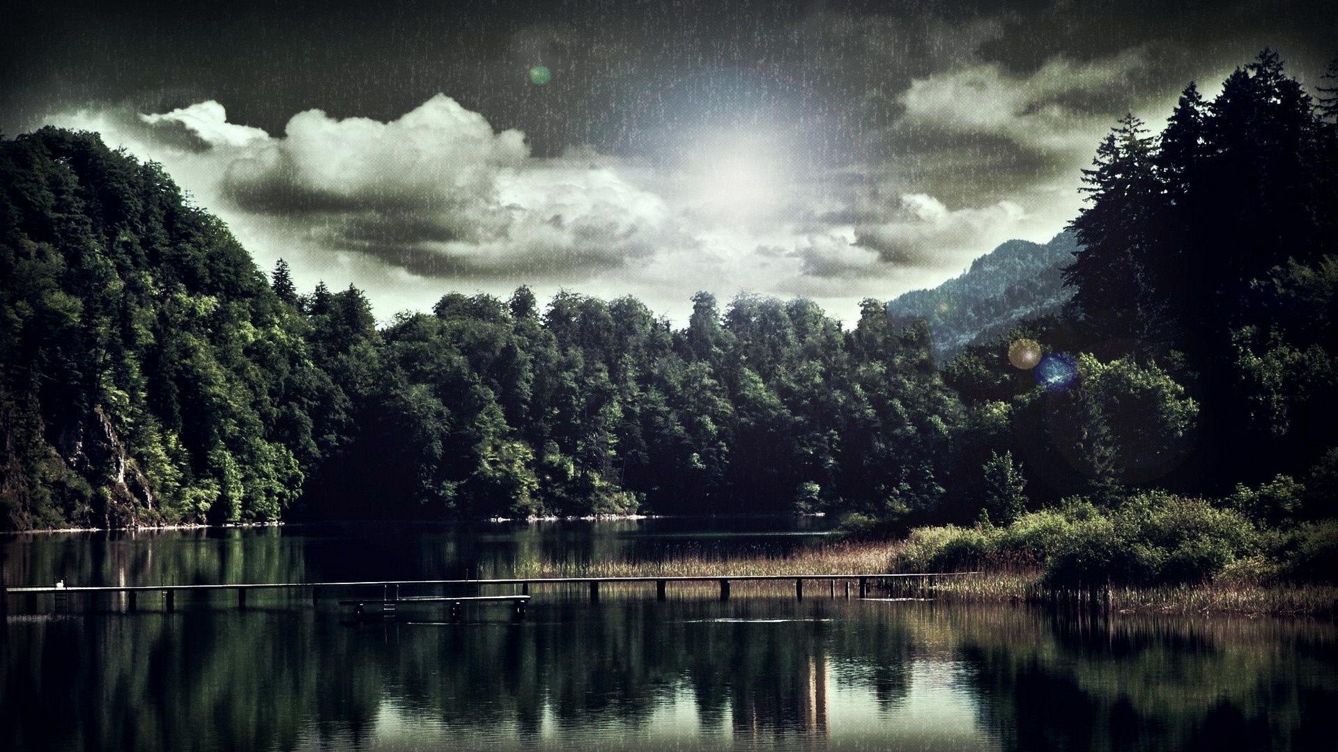 Lake and forest with wooden pier under cloudy sky HD Wallpaper