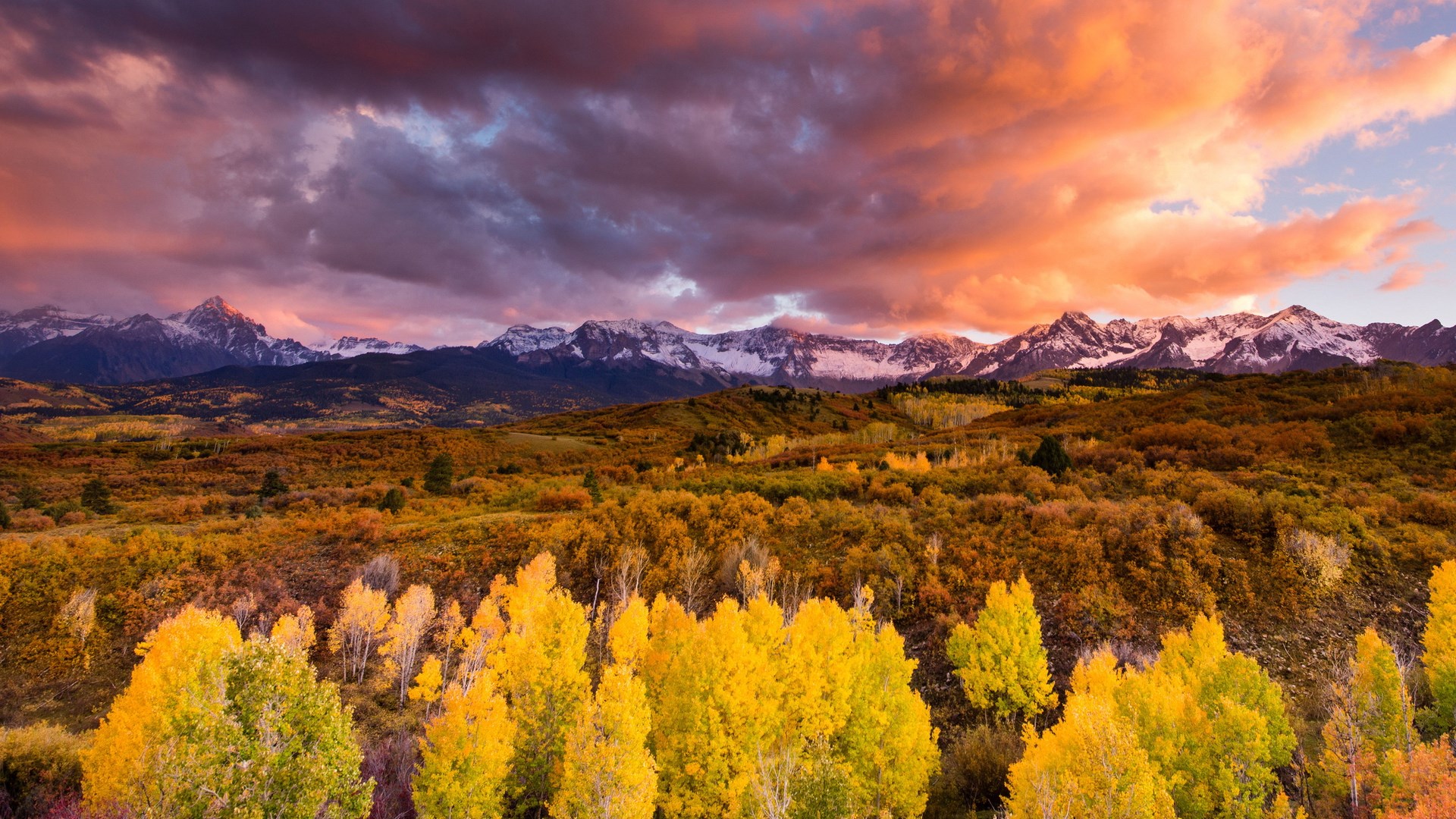 Autumn Mountain Landscape with Colorful Trees and Dramatic Sky HD Wallpaper