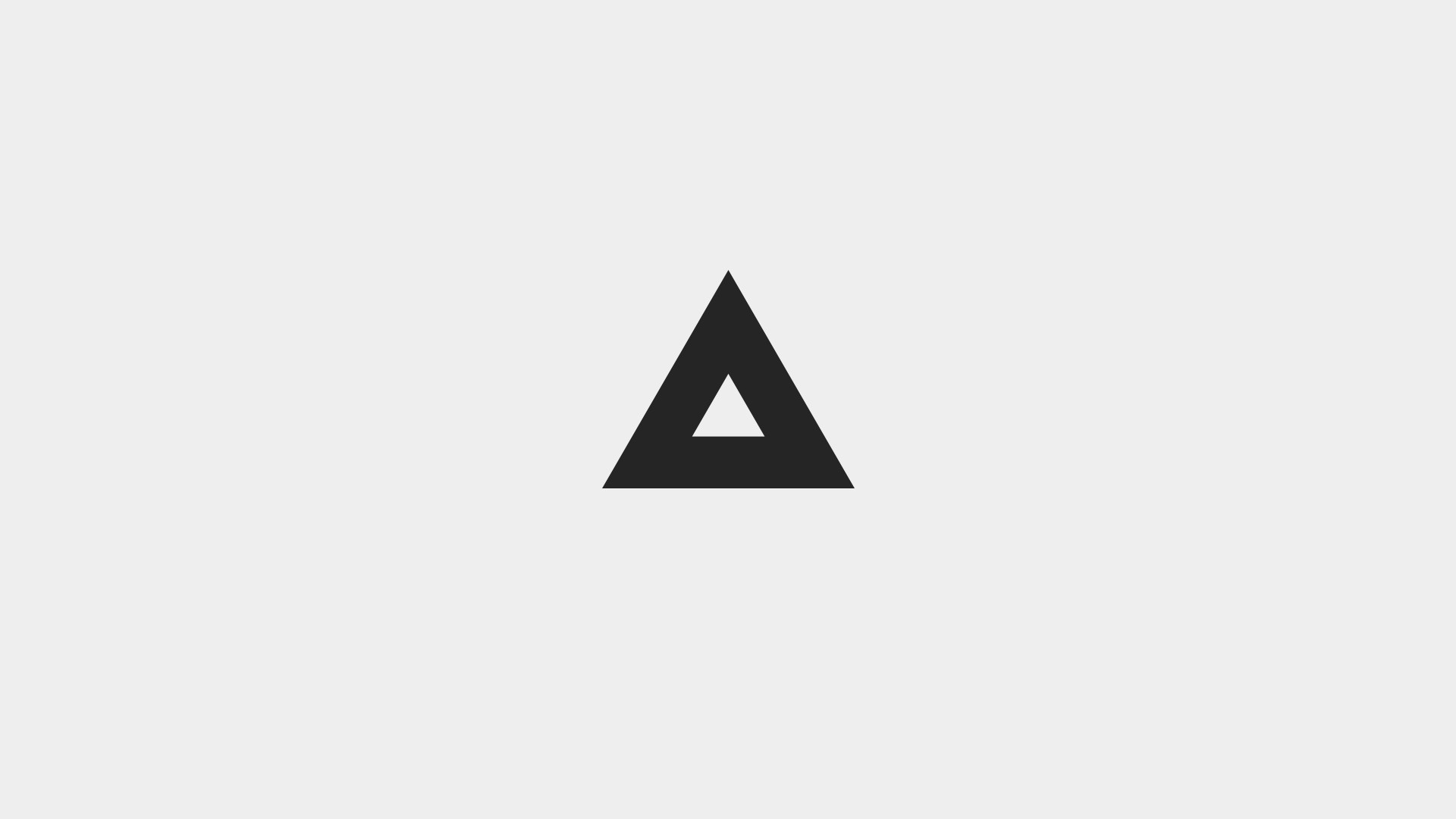 Black triangle with a white triangle cutout HD Wallpaper