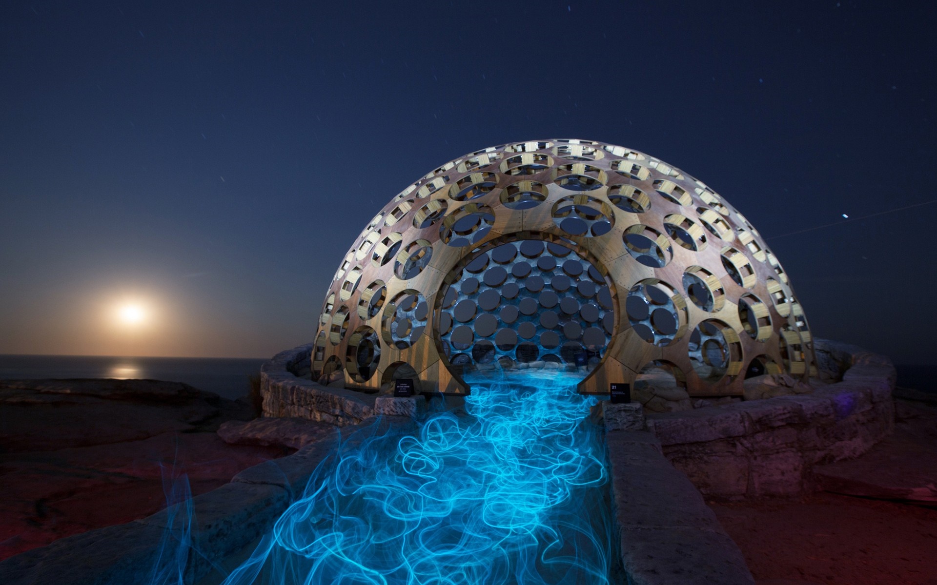 Dome artwork with blue light painting on the coast at night HD Wallpaper