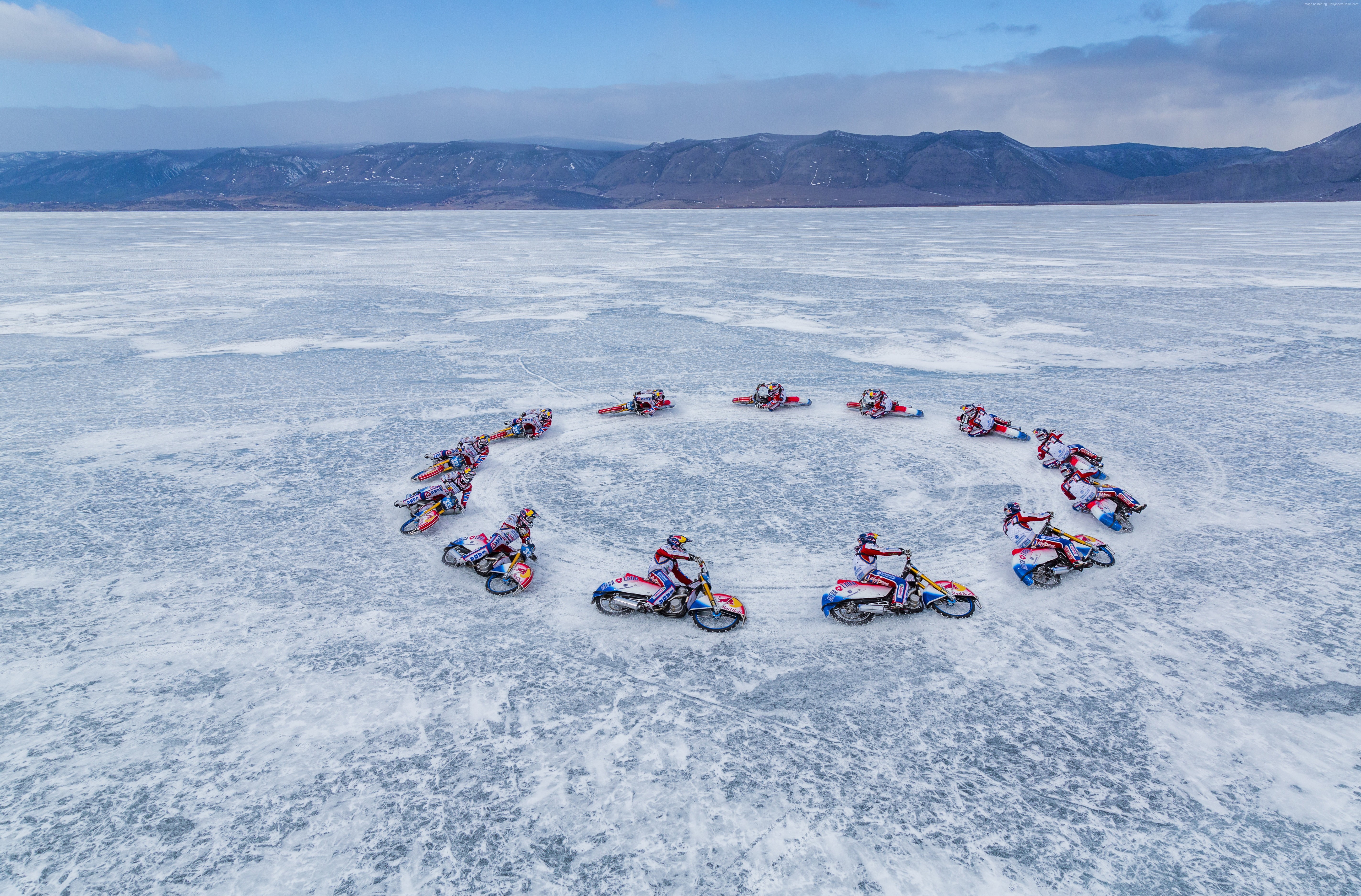 Motorcyclists in a circle on frozen Lake Baikal HD Wallpaper