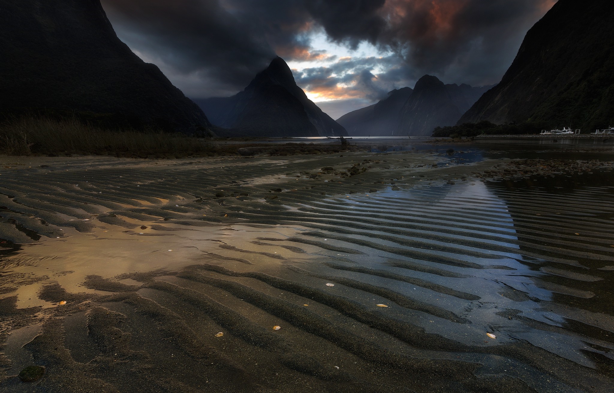 Mountain landscape with rippled sand and dramatic sky HD Wallpaper