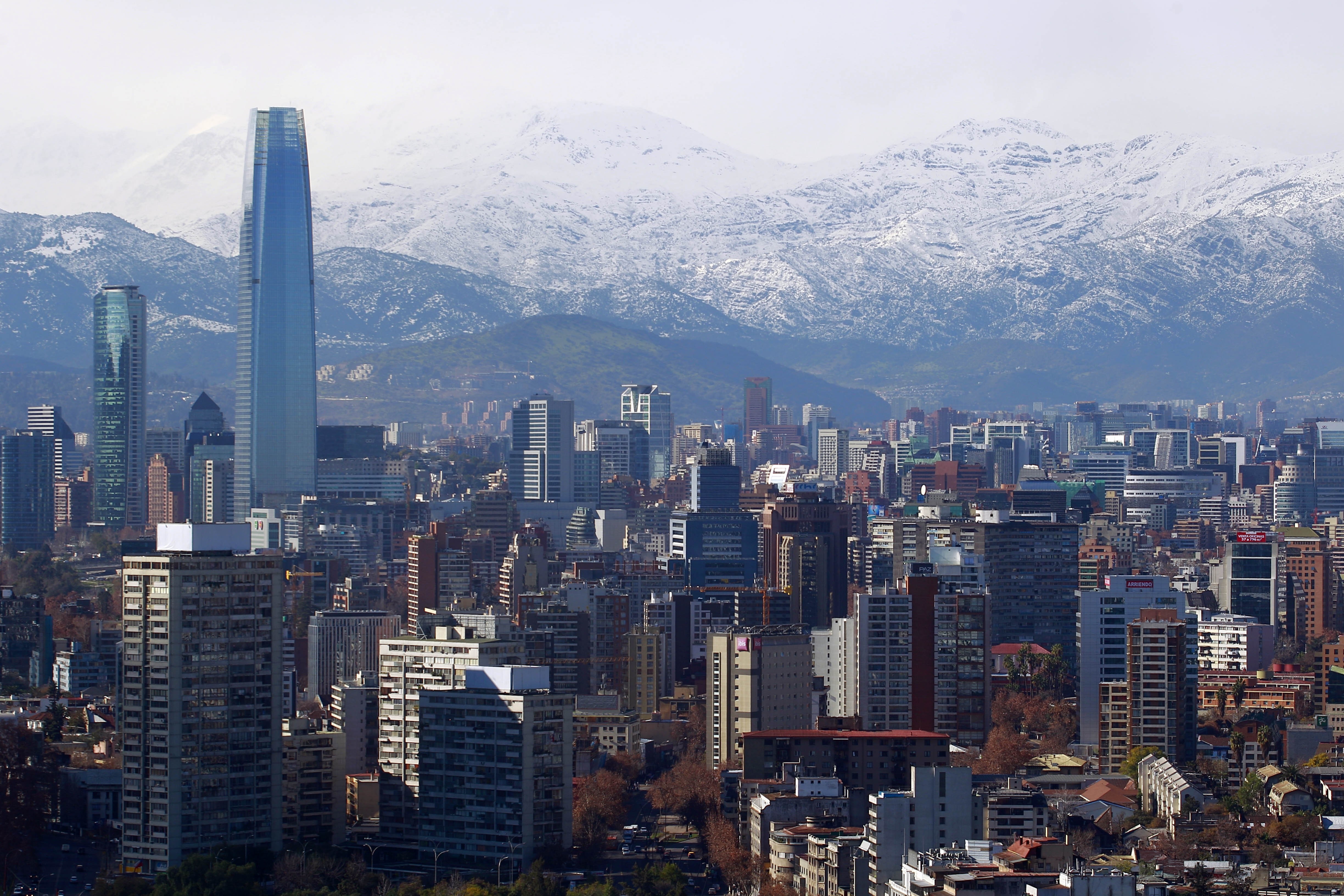 Santiago cityscape with snow-capped Andes mountains HD Wallpaper