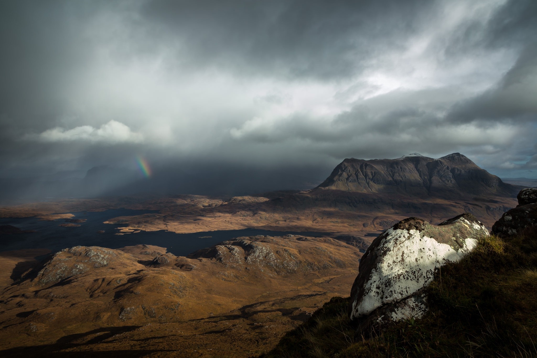 Rainbow over Scottish Highlands landscape with mountains HD Wallpaper