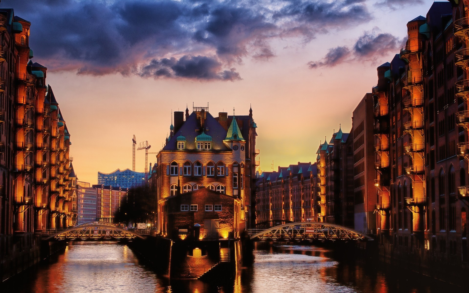 Hamburg Speicherstadt canal at sunset with bridges and buildings HD Wallpaper