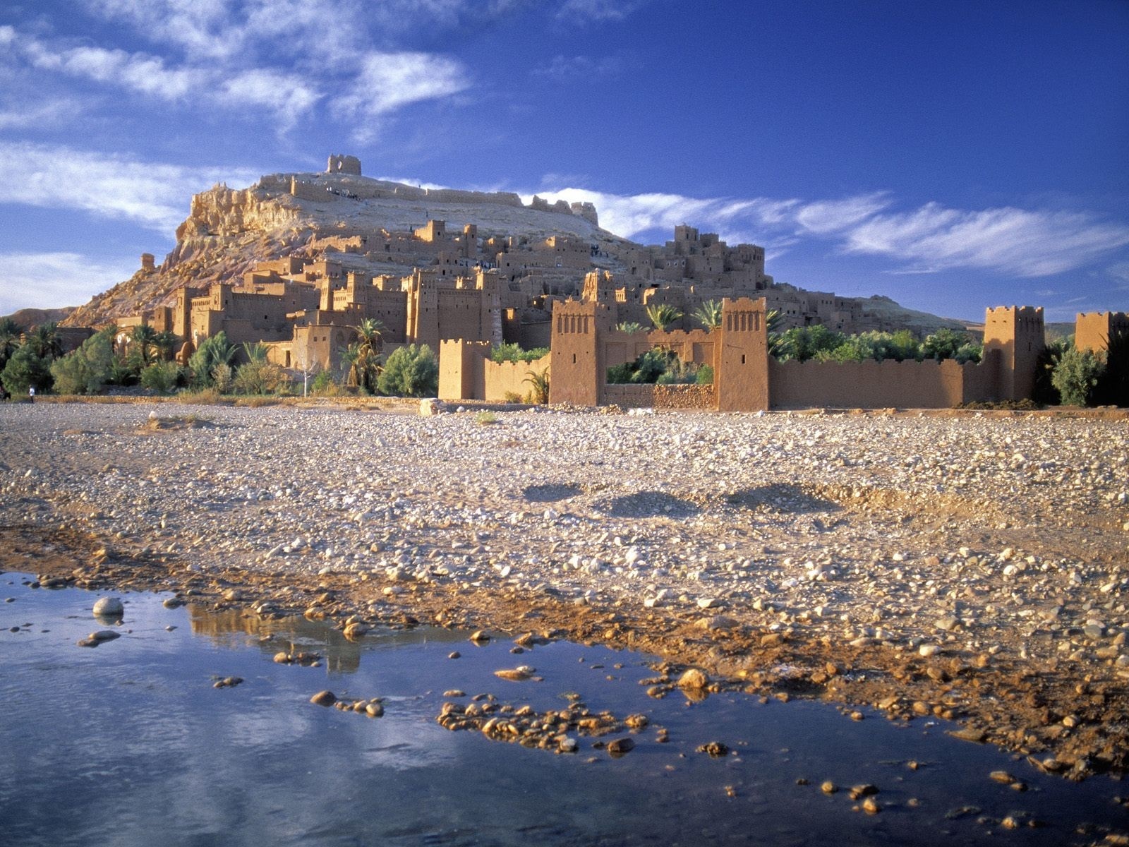 Ancient Kasbah on a Hillside by a River HD Wallpaper
