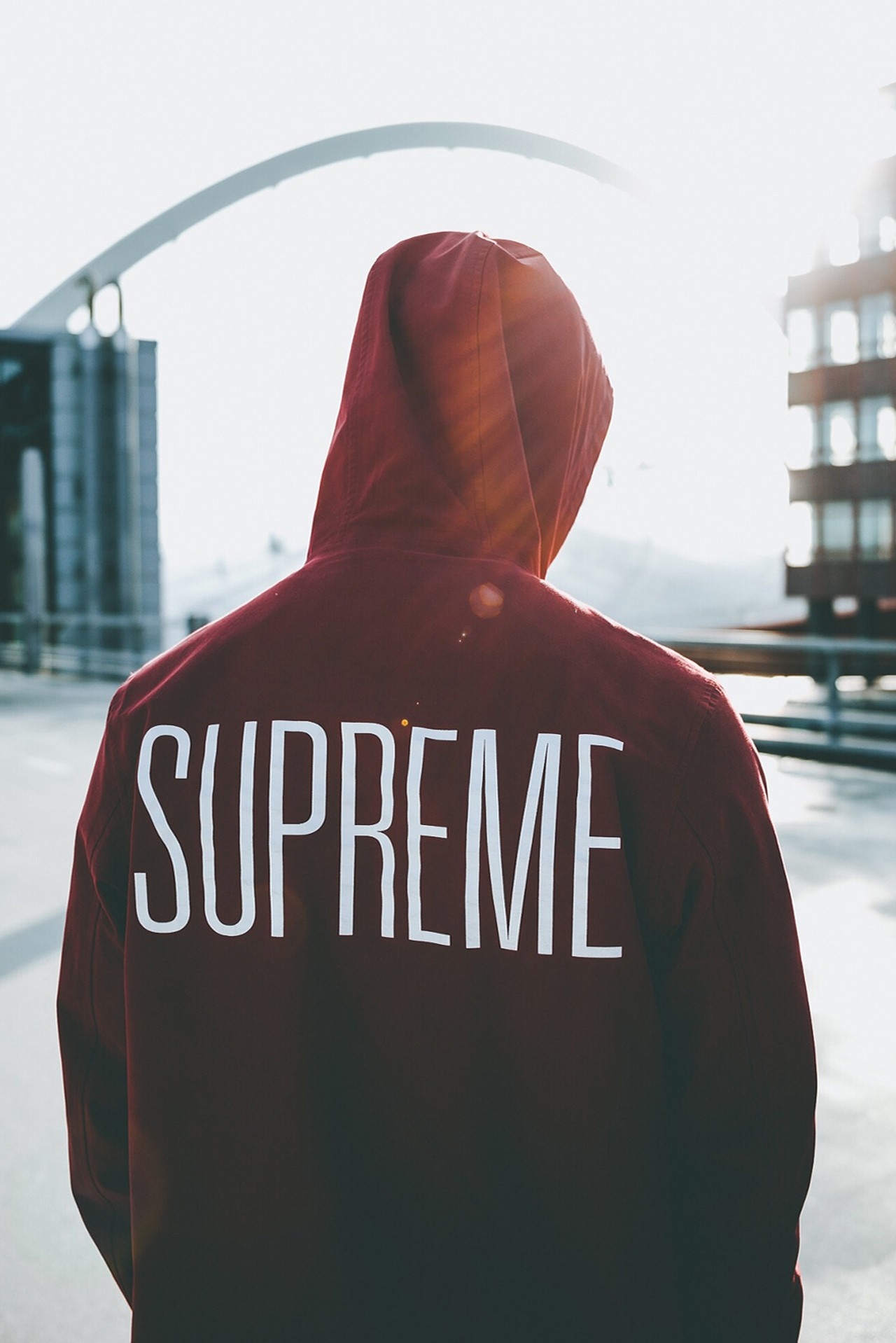 Person wearing a red Supreme hoodie HD Wallpaper