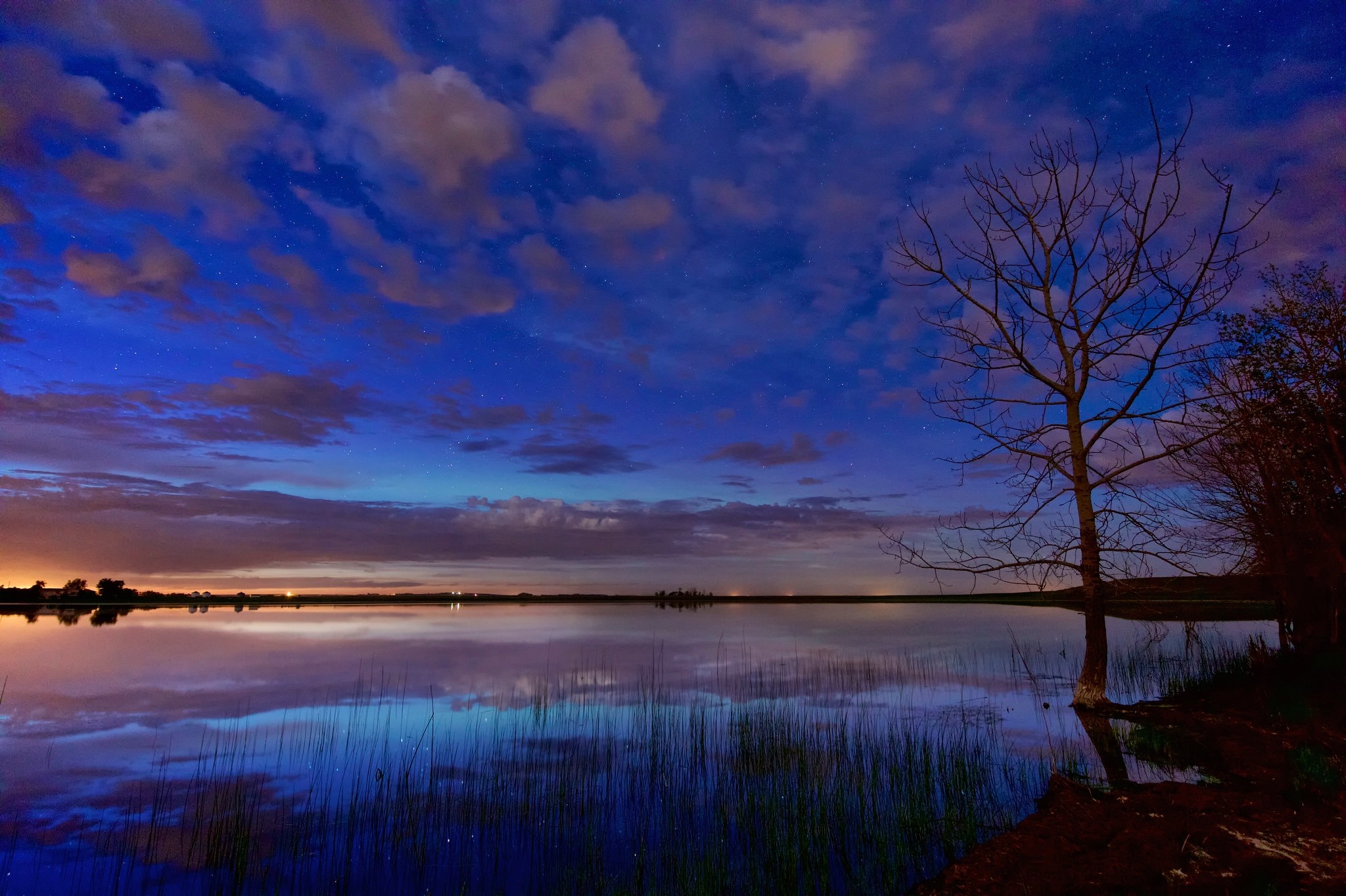 Twilight sky over a calm lake with reflections HD Wallpaper