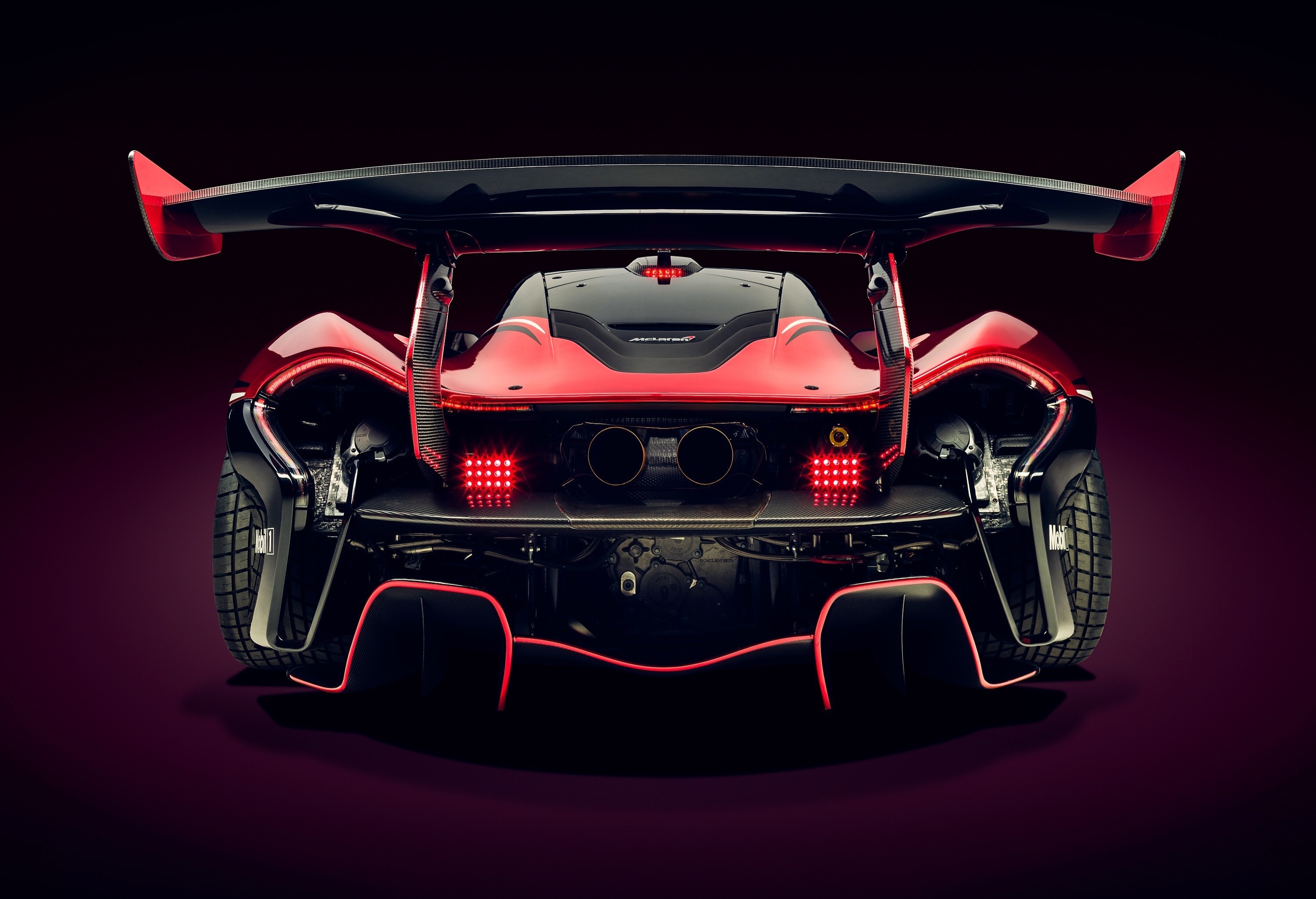 Rear view of a red McLaren P1 GTR HD Wallpaper