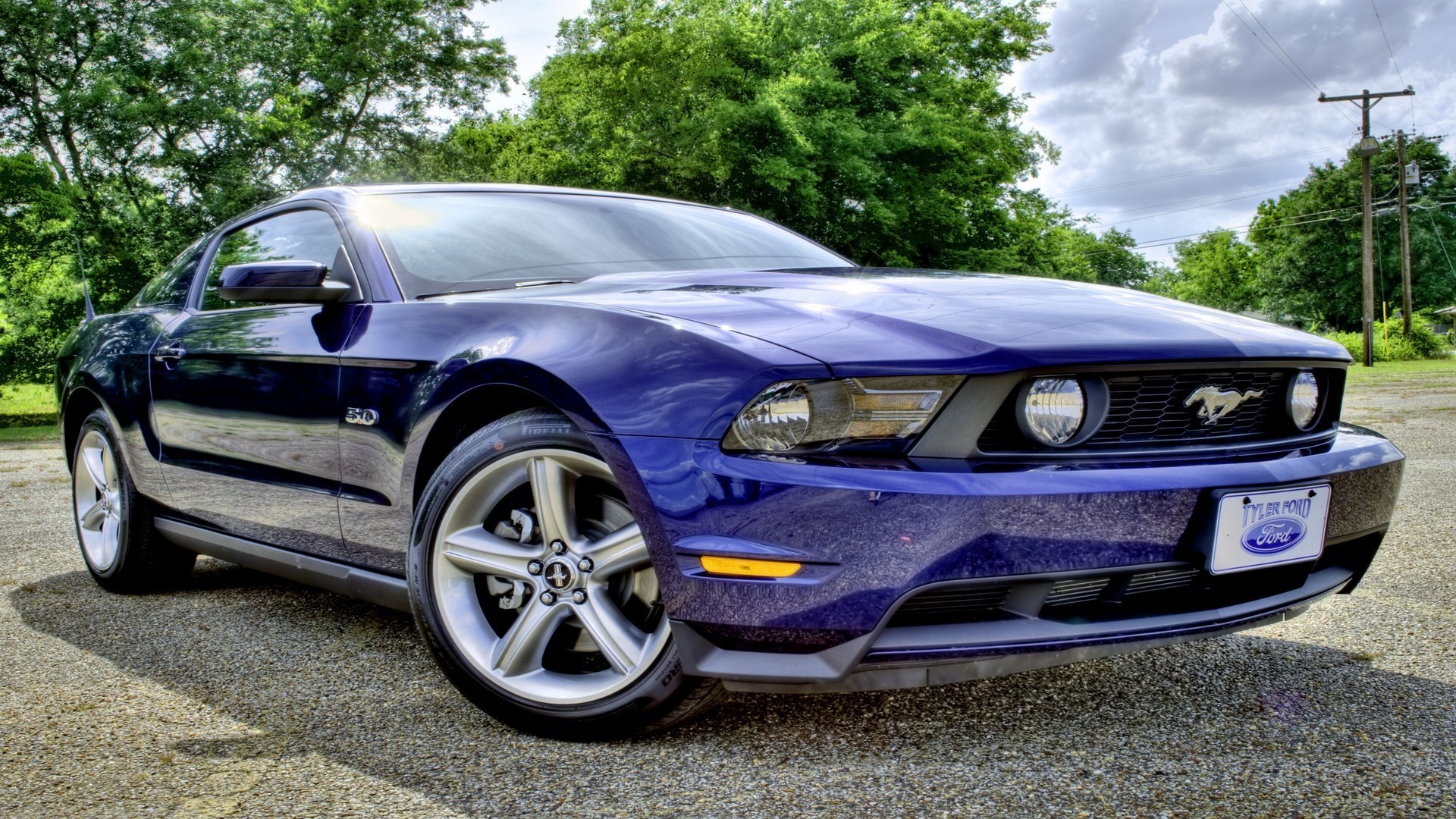 Blue Ford Mustang GT parked outdoors HD Wallpaper