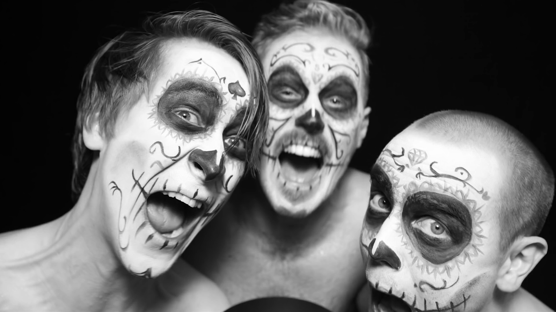 Three men with skull face paint HD Wallpaper