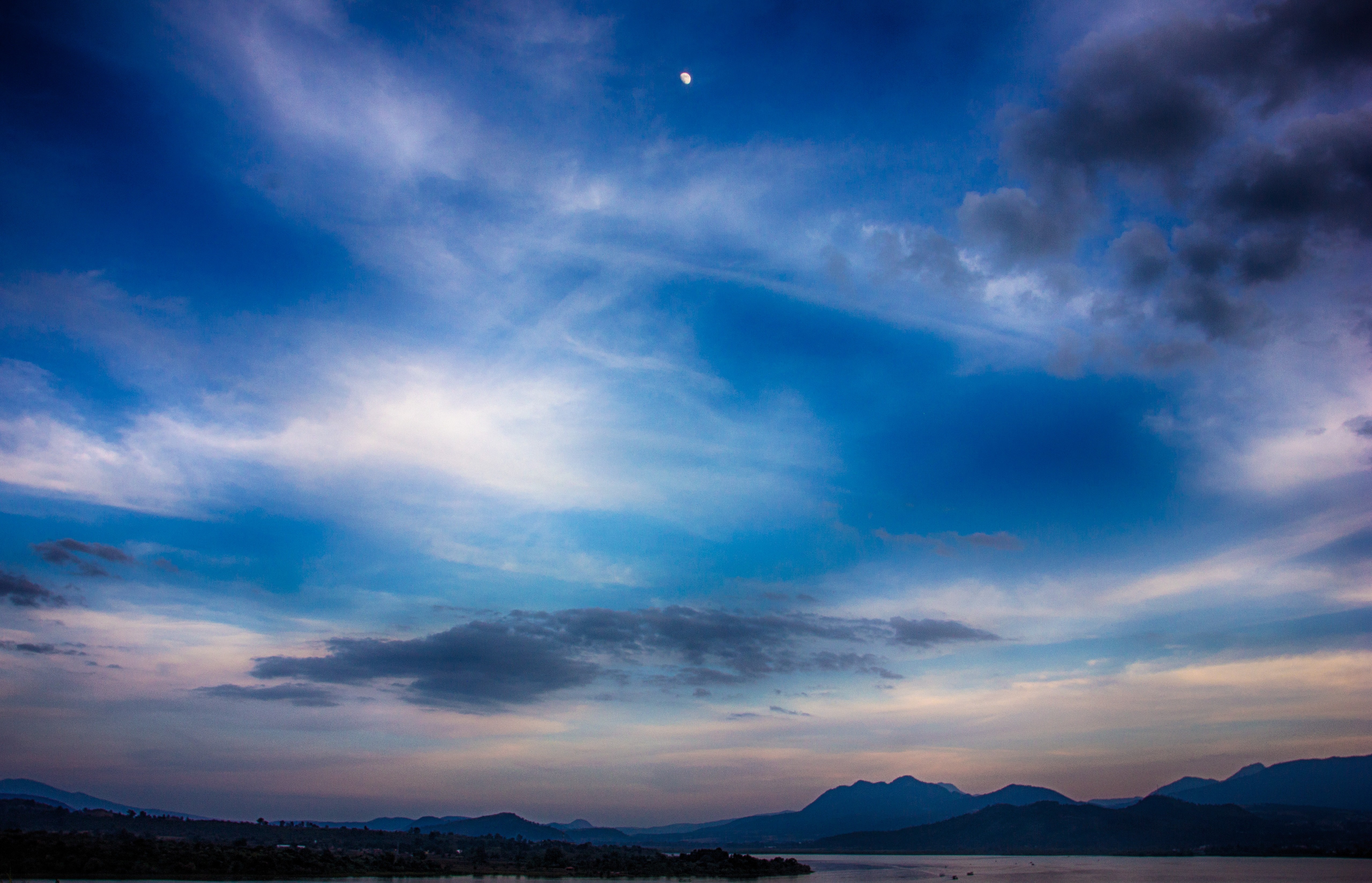 Moonlit Sky Over Mountains and Water HD Wallpaper