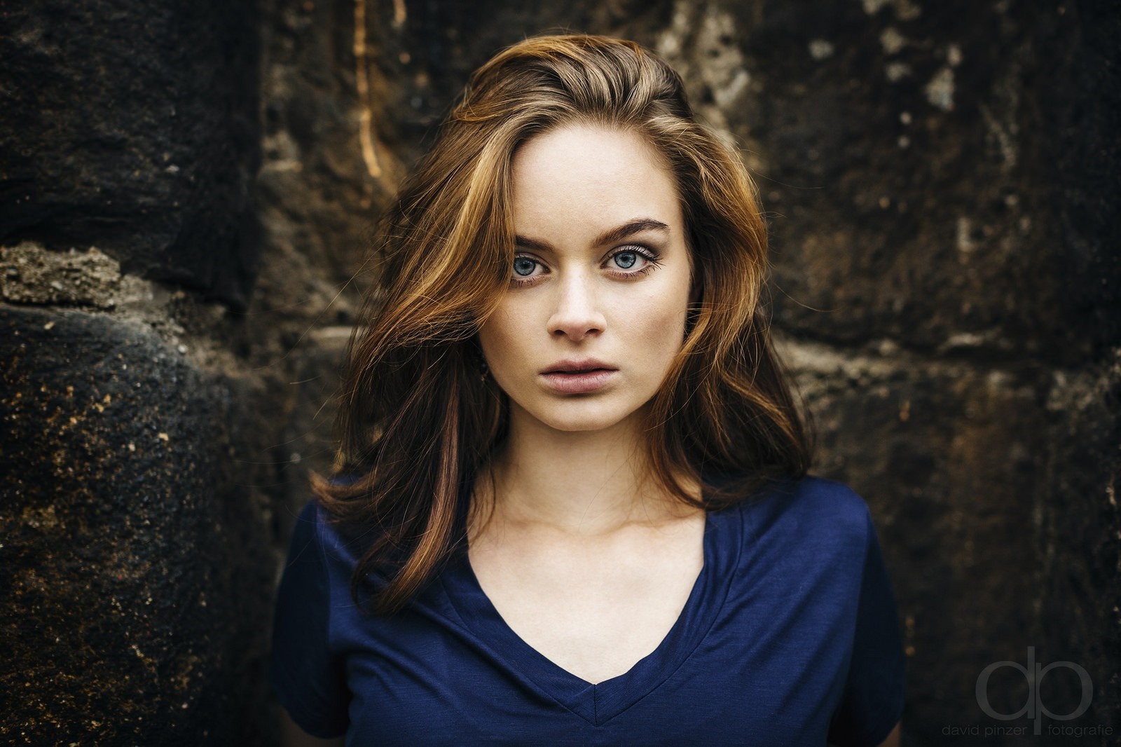 Woman with long brown hair and blue eyes HD Wallpaper